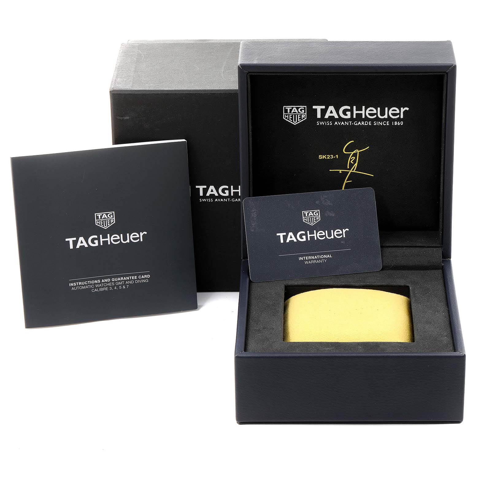 The image shows the packaging and warranty card for a Tag Heuer Limited Edition WAY201H.BA0927 Men's Stainless Steel Blue Dial WAY201H.BA0927 Men's Stainless Steel Blue Dial watch.