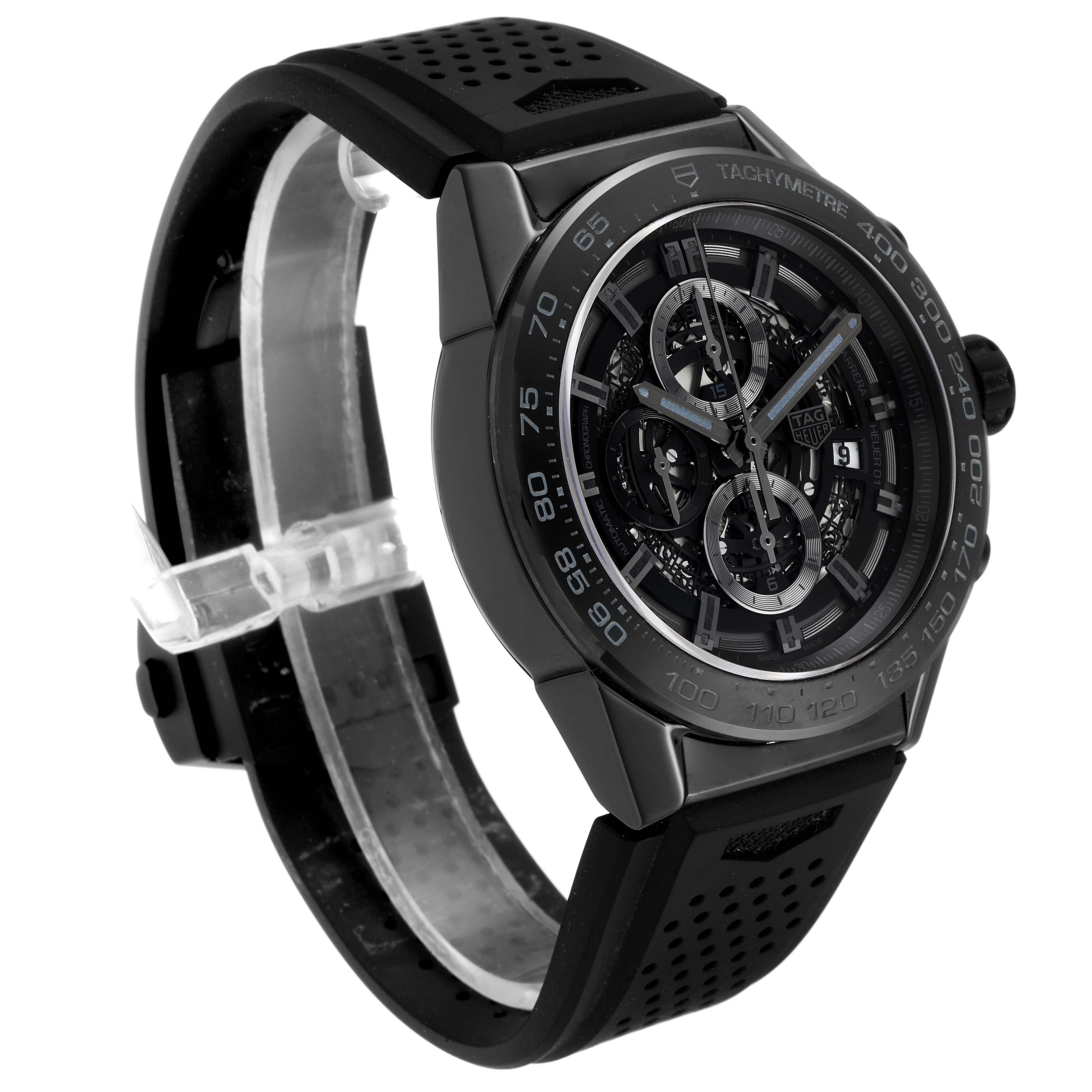 The image shows a Carrera model by Tag Heuer from a three-quarter angle, highlighting its dial, bezel, and perforated rubber strap.