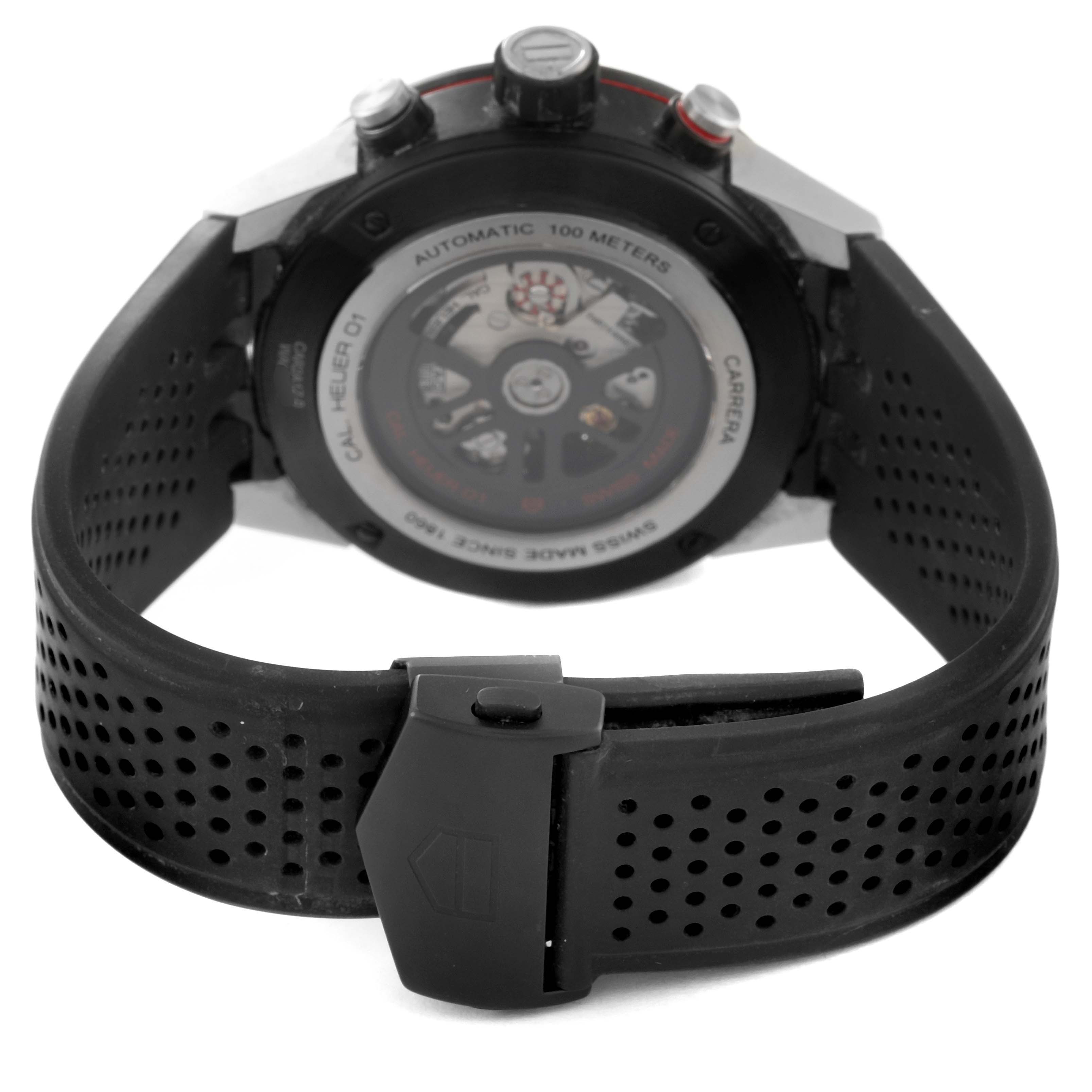The image shows the back view of a Tag Heuer Carrera CAR2A1Z.FT6044 Men's Stainless Steel Black Dial CAR2A1Z.FT6044 Men's Stainless Steel Black Dial watch, focusing on the movement and rubber strap.