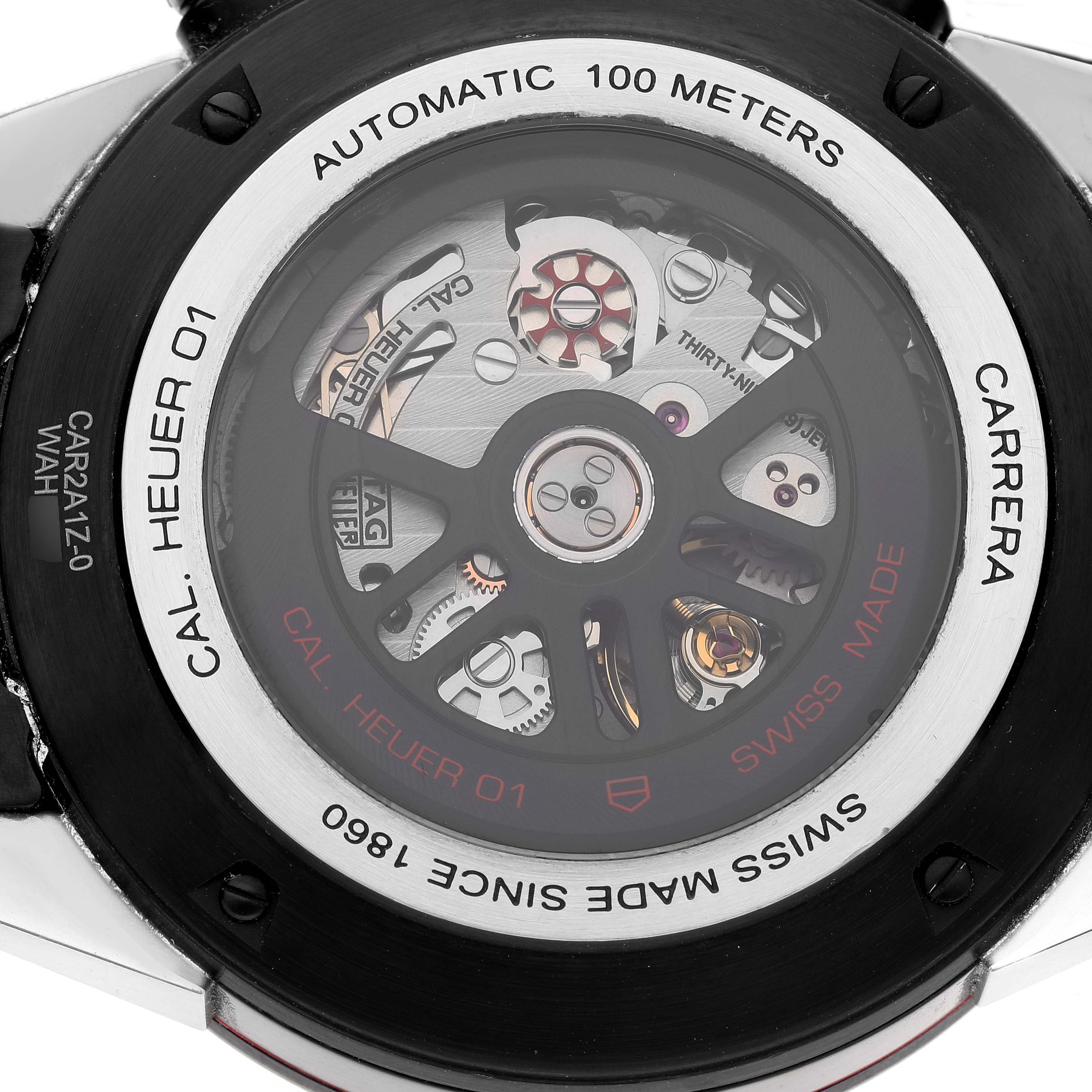 The image shows the back of a Tag Heuer Carrera CAR2A1Z.FT6044 Men's Stainless Steel Black Dial CAR2A1Z.FT6044 Men's Stainless Steel Black Dial watch, displaying its automatic movement and inner mechanics.