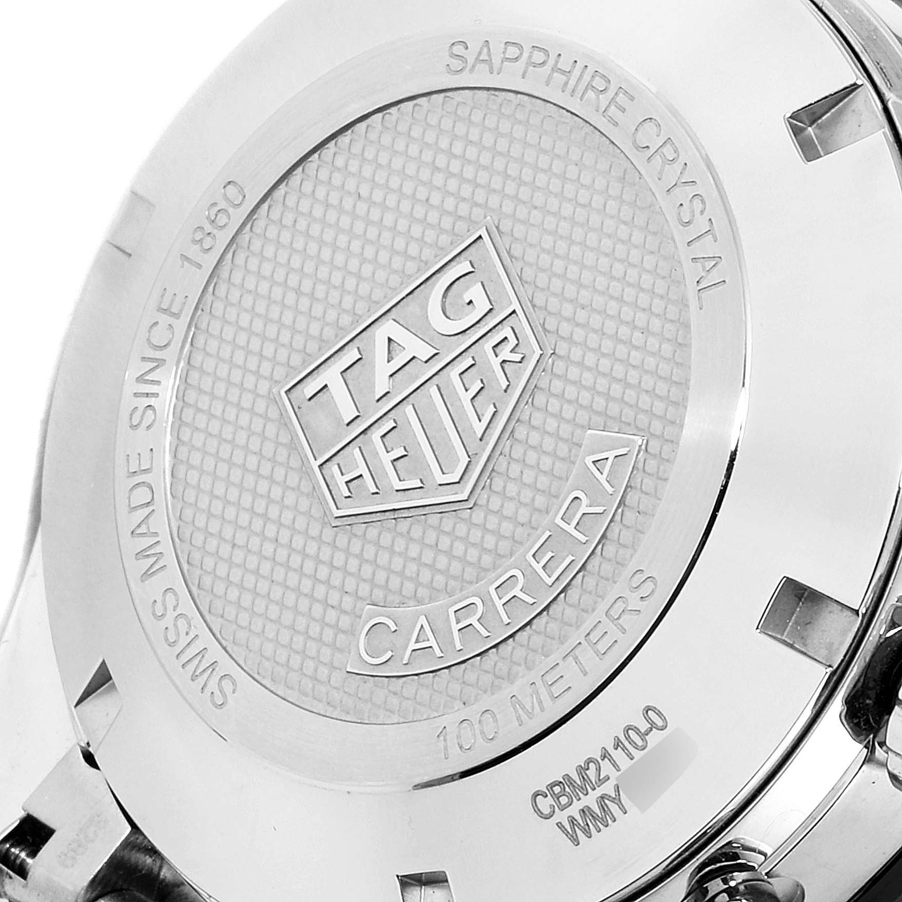 The image shows the back case of a Tag Heuer Carrera CBM2110 Men
s Stainless Steel Black Dial CBM2110 Men
s Stainless Steel Black Dial watch, highlighting the engraved logo and model details.