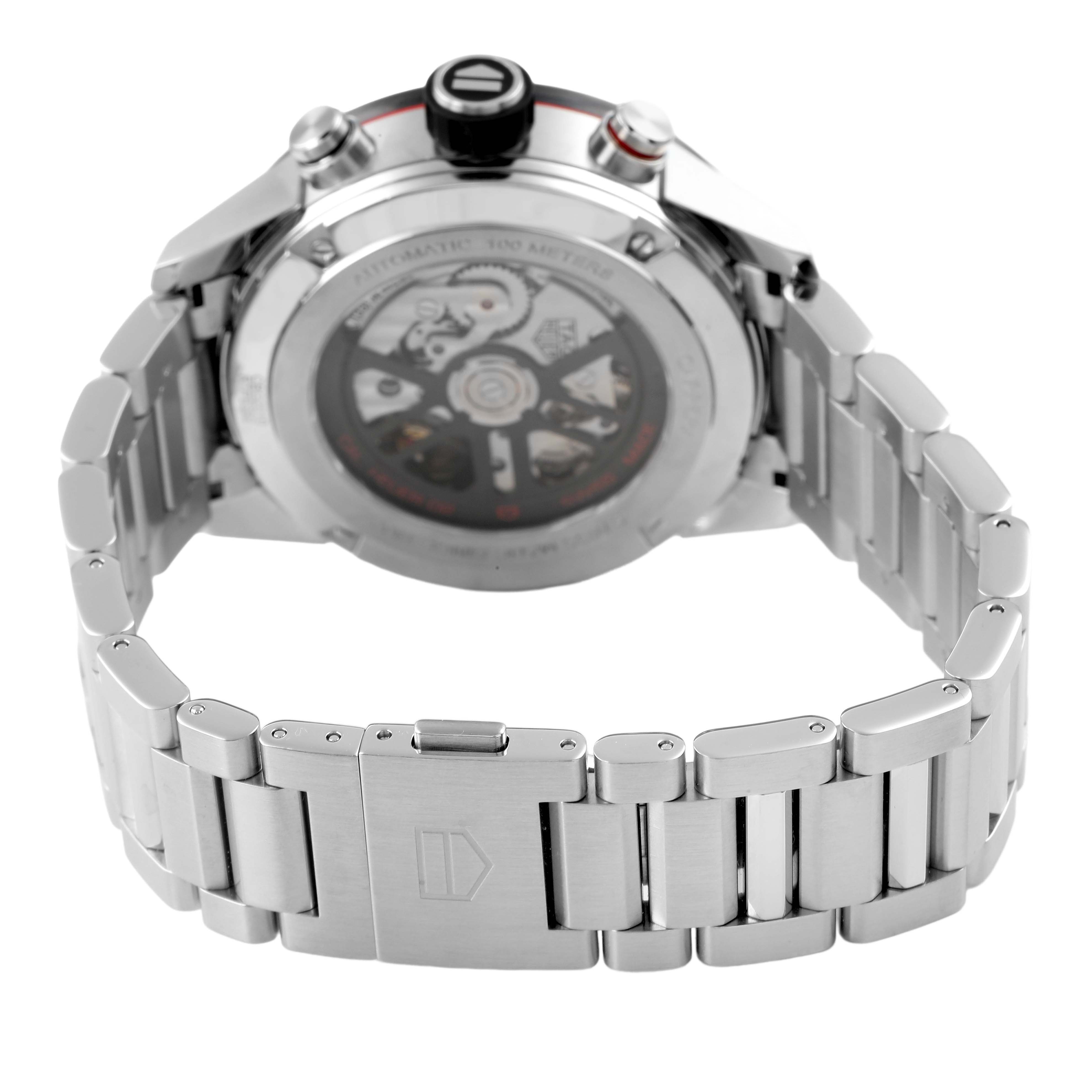 The Tag Heuer Carrera CBG2010 Men's Stainless Steel Black Dial watch is shown from a rear angle, highlighting its bracelet and transparent case back.