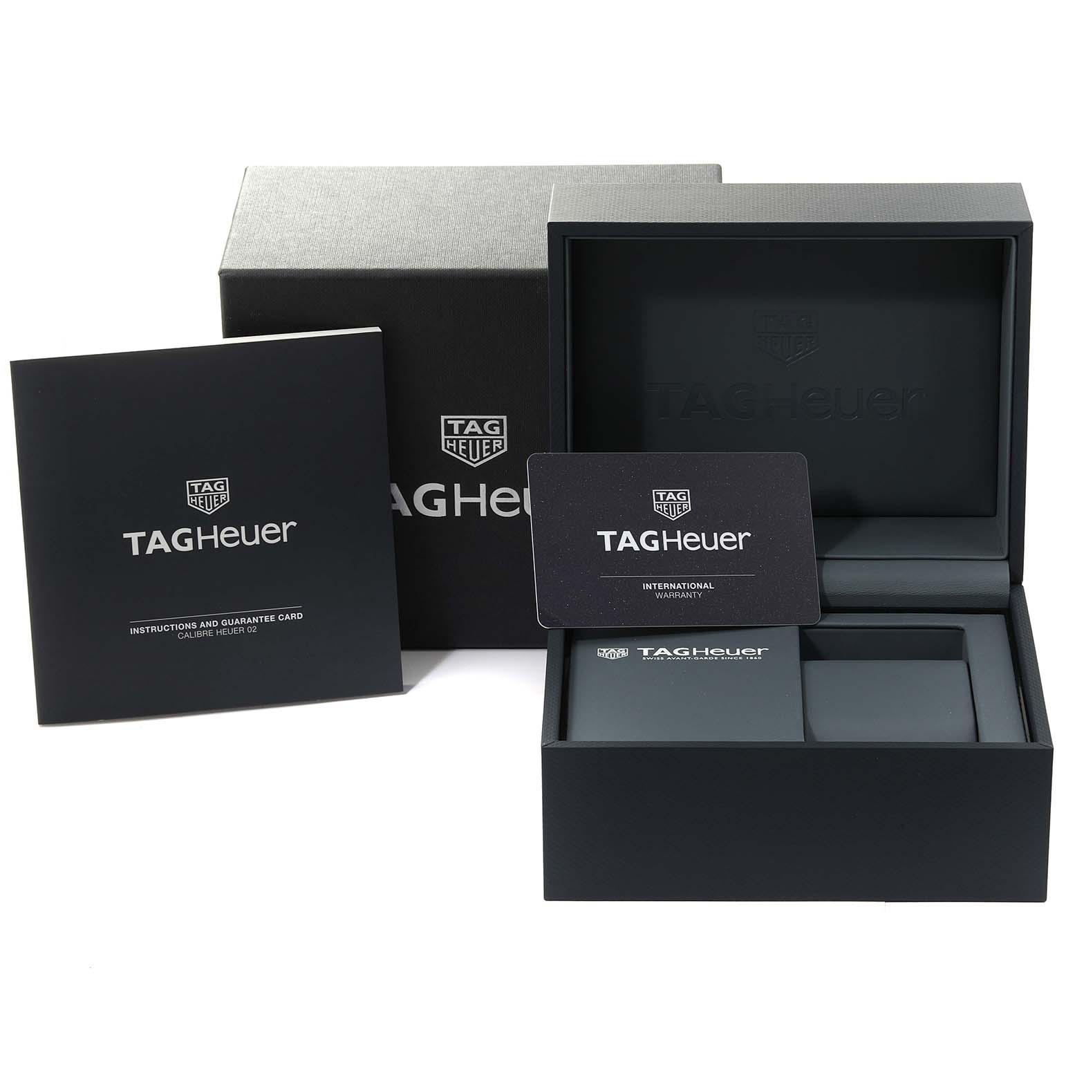 The image shows the packaging, instruction manual, and international warranty card for the Tag Heuer Carrera CBN2A5A.FC6481 Men's Steel and Gold (two tone) Black Dial CBN2A5A.FC6481 Men's Steel and Gold (two tone) Black Dial watch model.
