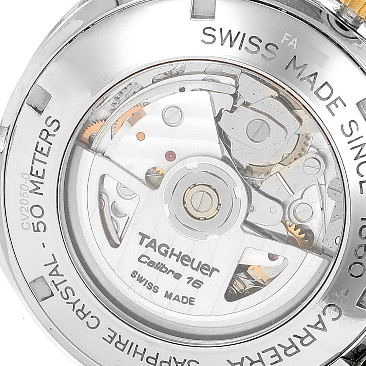 The image shows the back case of a Tag Heuer Carrera CV2050.BD0789 Men's Steel and Gold (two tone) Silver Dial CV2050.BD0789 Men's Steel and Gold (two tone) Silver Dial watch, highlighting the Caliber 16 movement through a sapphire crystal.