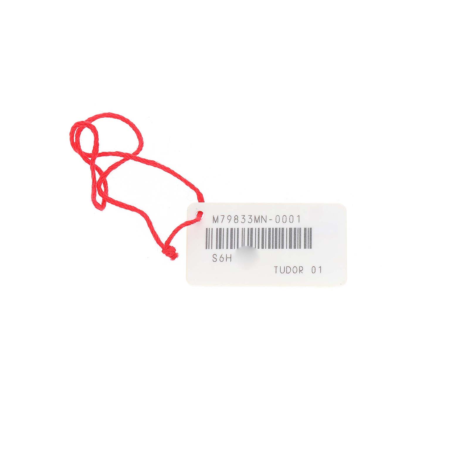 The image shows a tag with a barcode and model number for the Tudor Heritage Black Bay 79833MN Men's Steel and Gold (two tone) Black Dial, with a red string attached.