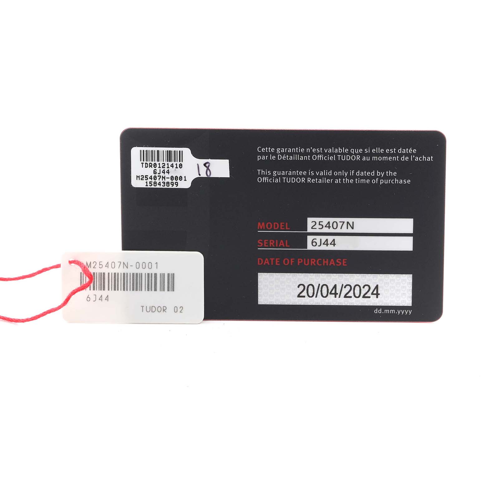 The image shows a warranty card for the Tudor Pelagos 25407 Men's Titanium Black Dial 25407 Men's Titanium Black Dial watch, displaying its model number, serial, and purchase date.