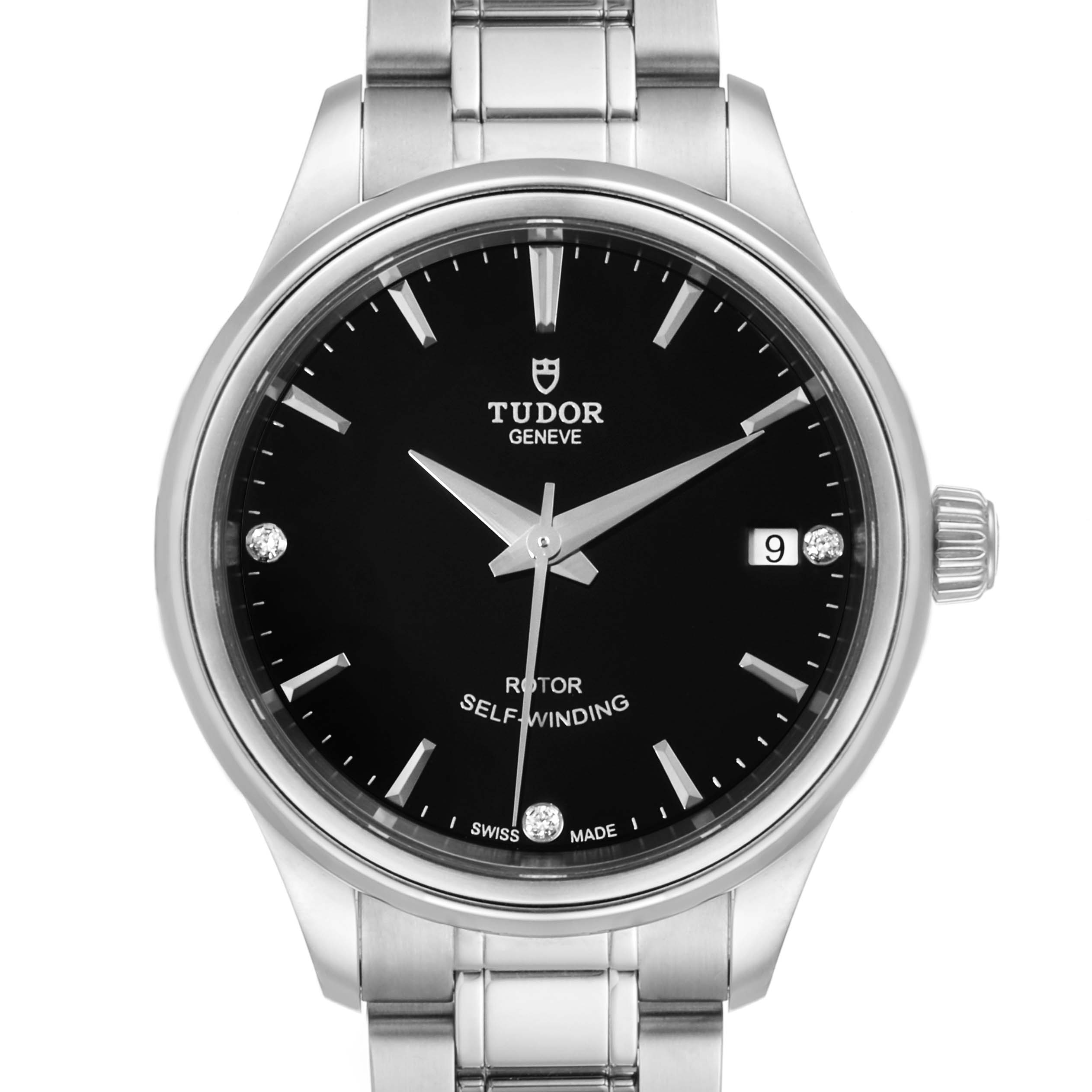 This image shows a front view of the Tudor Style M12300-0004 Women's Stainless Steel Black Dial M12300-0004 Women's Stainless Steel Black Dial model watch, highlighting its black dial, metal bracelet, and date window.