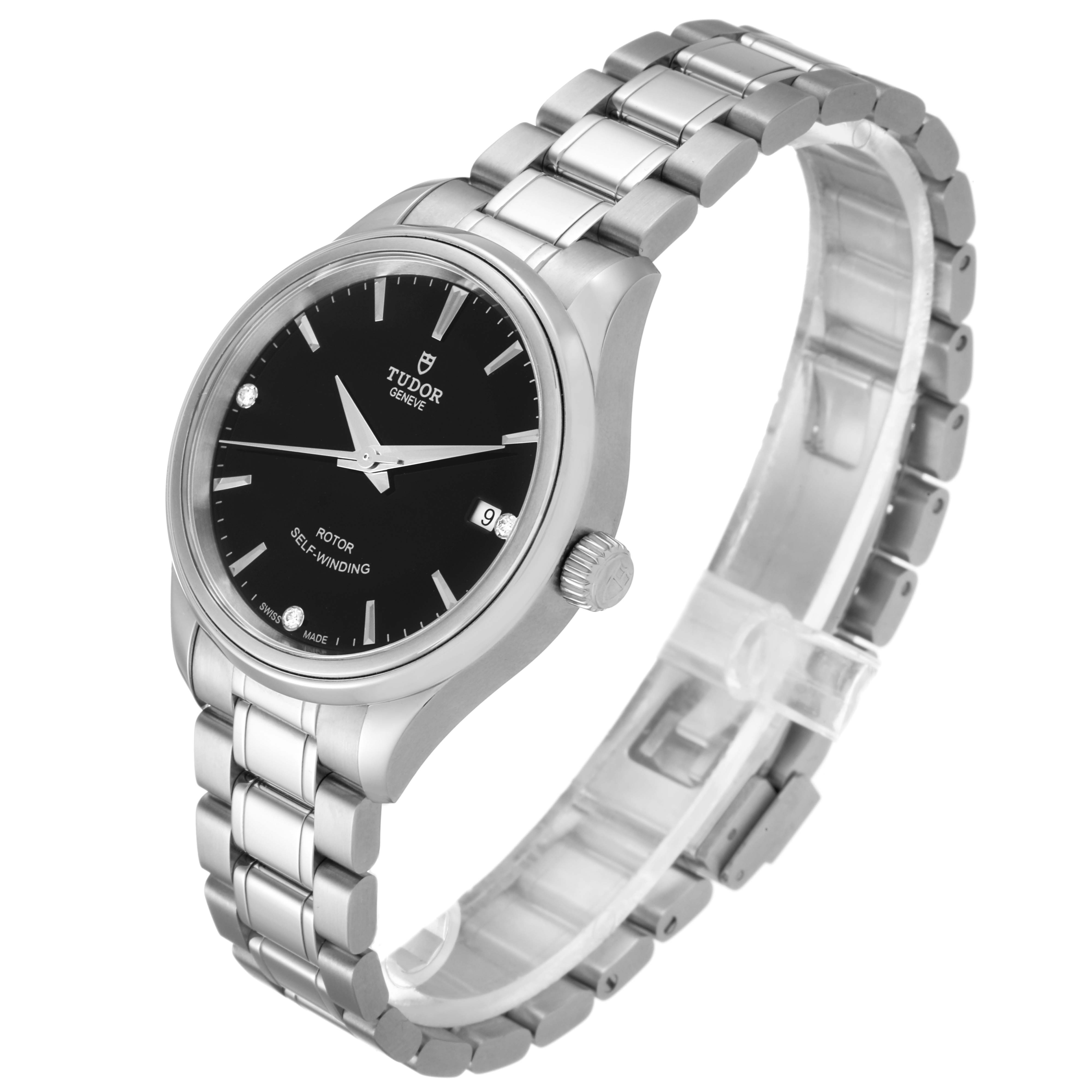 The image shows a side angle of the Tudor Style M12300-0004 Women's Stainless Steel Black Dial M12300-0004 Women's Stainless Steel Black Dial watch, highlighting the face, bracelet, and crown.