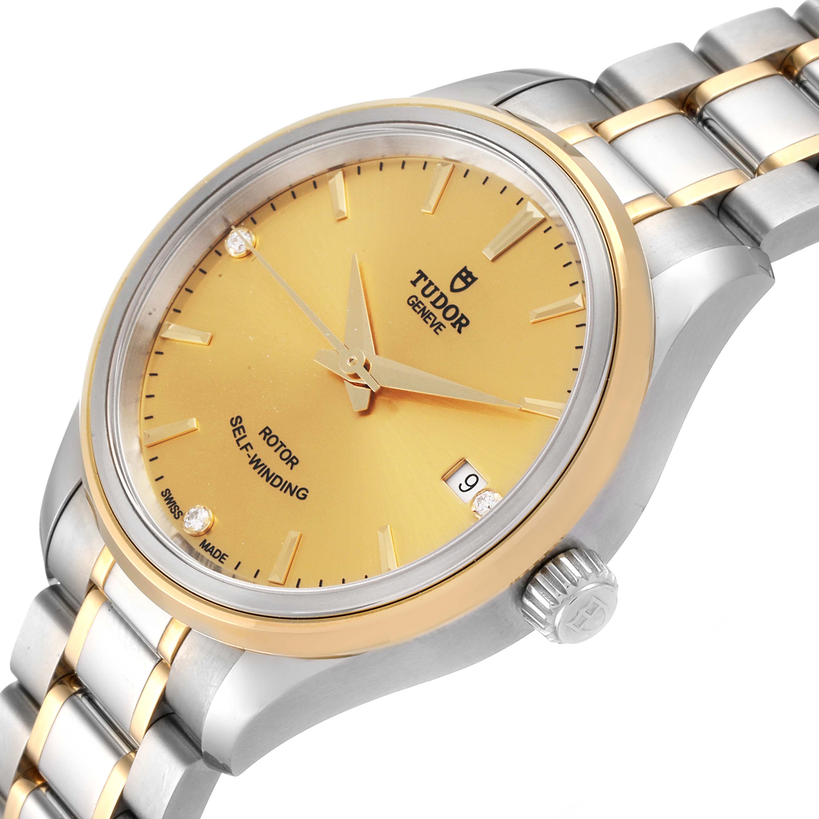The image shows a close-up angled view of the Tudor Style M12303 Women's Steel and Gold (two tone) Champagne Dial M12303 Women's Steel and Gold (two tone) Champagne Dial watch's face, crown, and two-tone bracelet.