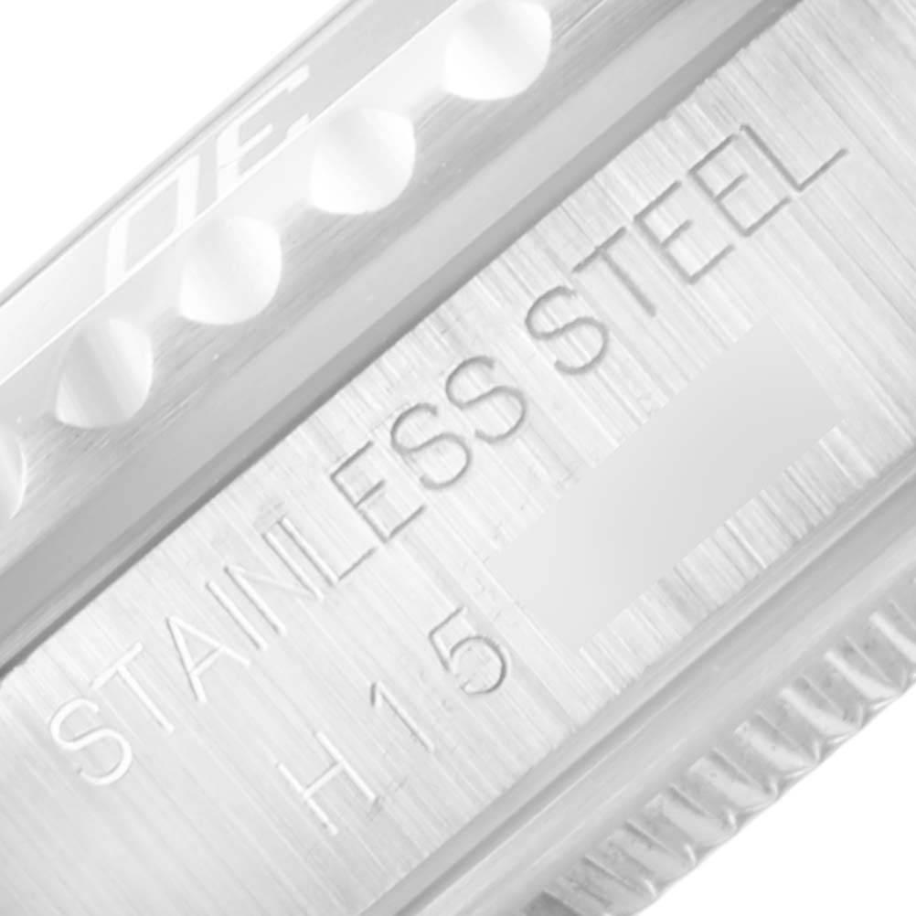 This image shows a close-up side view of the bezel and stainless steel case of a Tudor Submariner 75190 Men's Stainless Steel Black Dial 75190 Men's Stainless Steel Black Dial watch.