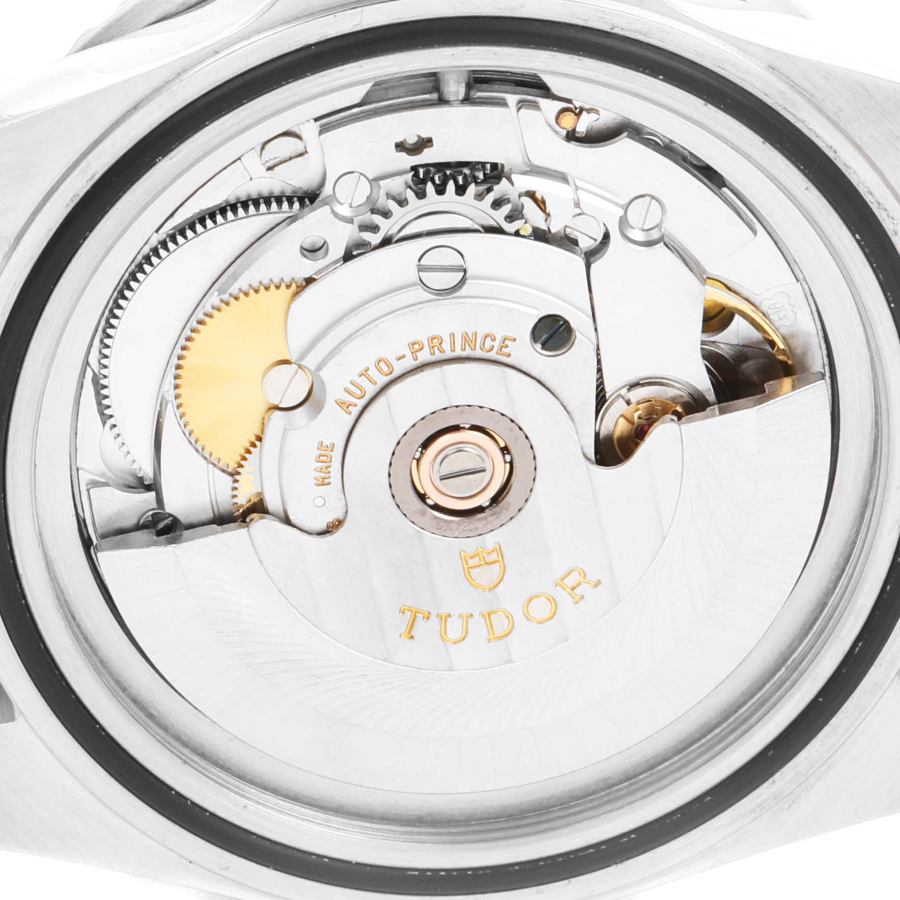 This is a close-up view of the movement mechanism of a Tudor Submariner 75190 Men's Stainless Steel Black Dial 75190 Men's Stainless Steel Black Dial watch, showcasing the gears and "AUTO-PRINCE" inscription.