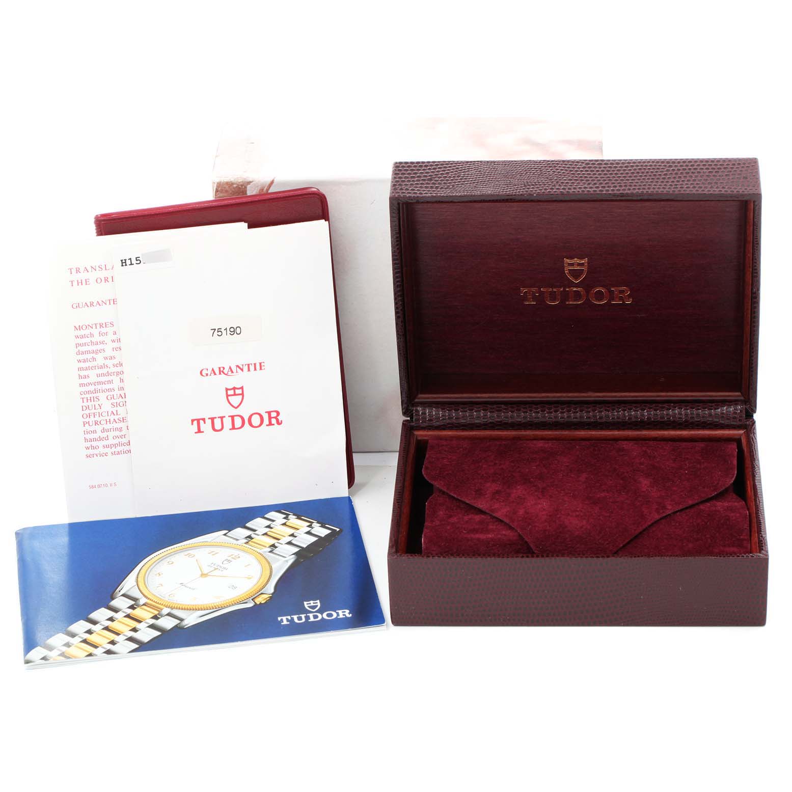 The image shows a Tudor Submariner 75190 Men's Stainless Steel Black Dial 75190 Men's Stainless Steel Black Dial watch box, guarantee booklet, and a user manual.