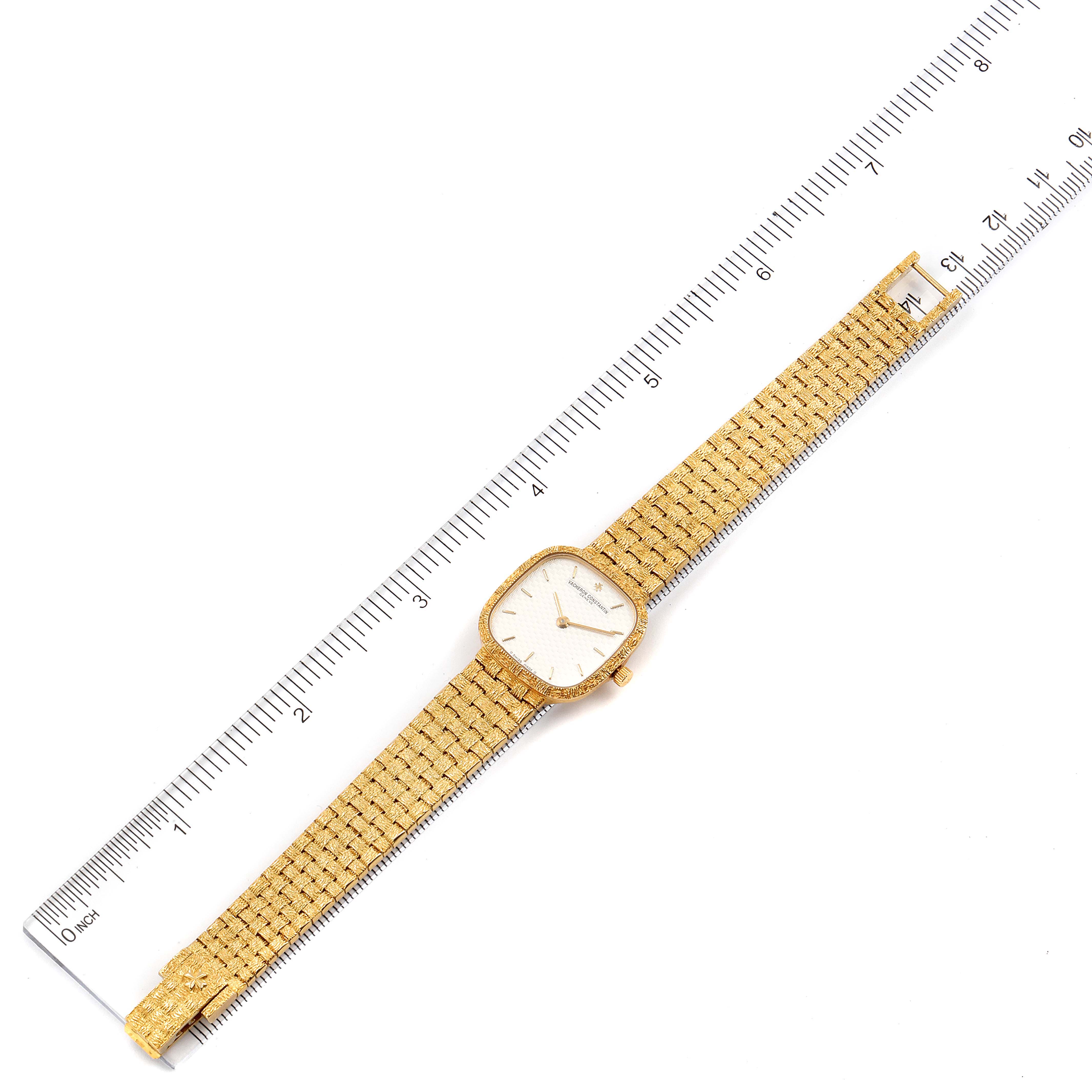 This image shows a top-down view of a Vintage Vacheron Constantin watch placed alongside a ruler for measurement.