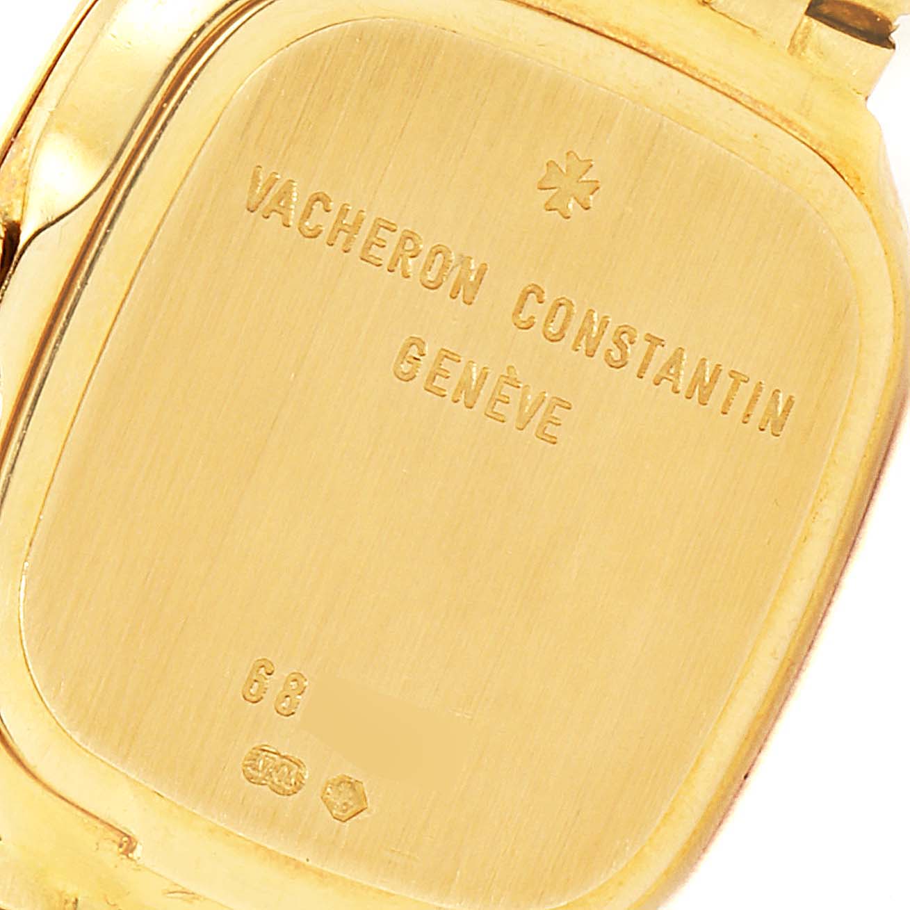 The image shows the back case of a Vintage Vacheron Constantin watch with the brand and Geneva markings.