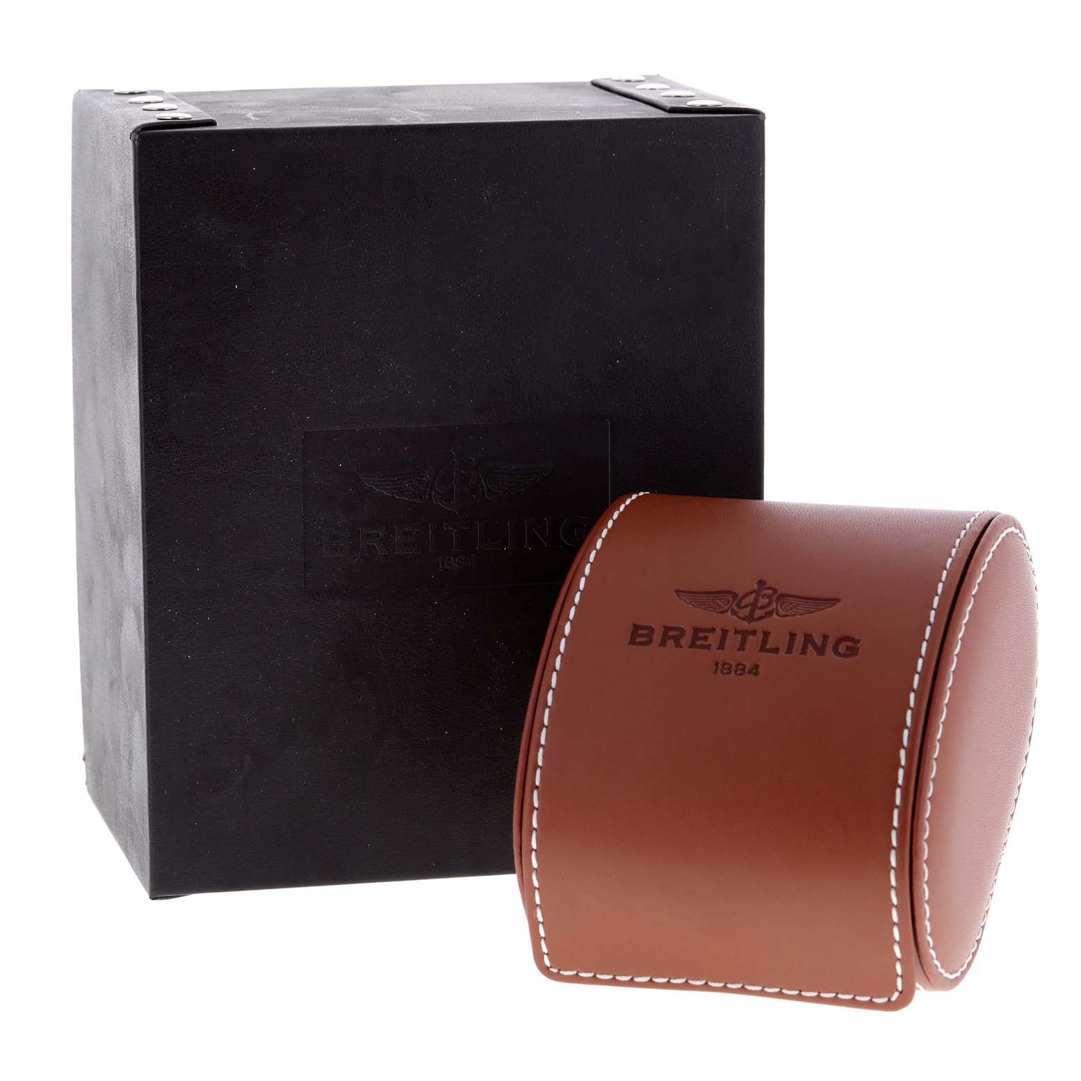 The image shows the packaging for a Breitling Avenger V17310 Men's Titanium Black Dial V17310 Men's Titanium Black Dial watch, featuring a black outer box and a brown leather case with white stitching.