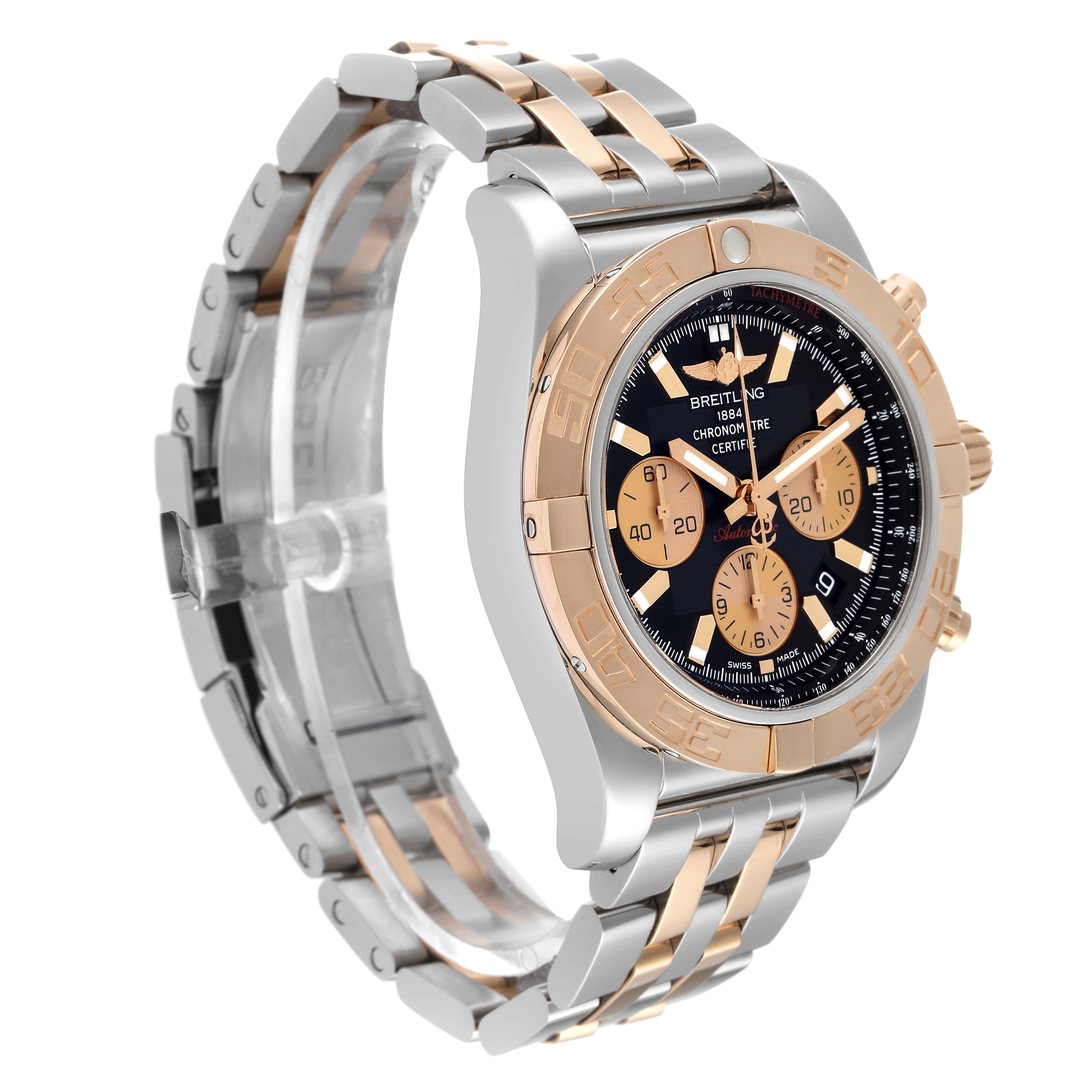 The Breitling Chronomat CB0110121B1C1 Men's Steel and Gold (two tone) Black Dial CB0110121B1C1 Men's Steel and Gold (two tone) Black Dial watch is shown at a three-quarter angle, highlighting its dial, bezel, and metallic strap.