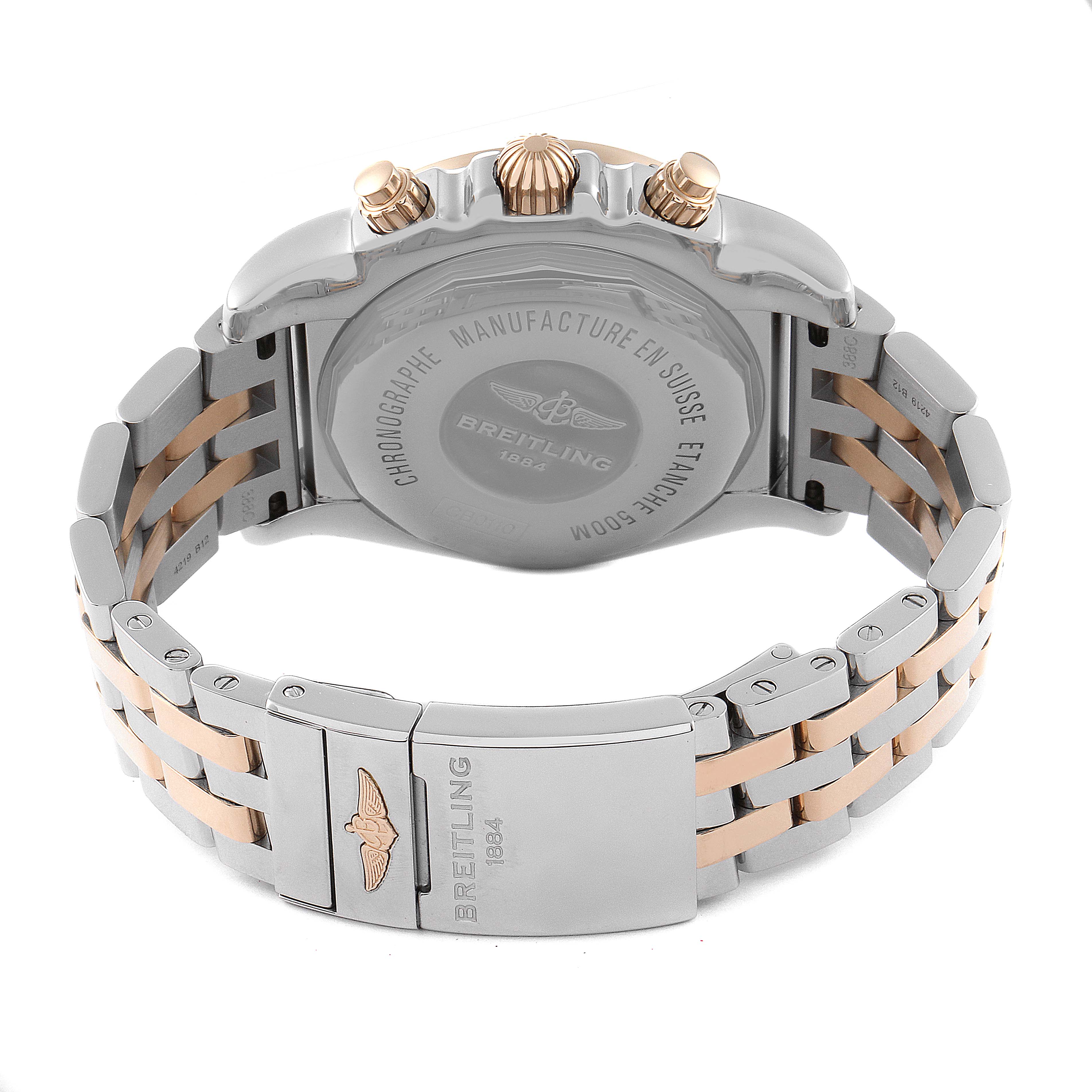 The image shows the back case and bracelet clasp of a Breitling Chronomat CB0110121B1C1 Men's Steel and Gold (two tone) Black Dial CB0110121B1C1 Men's Steel and Gold (two tone) Black Dial watch, primarily focusing on the rear view.