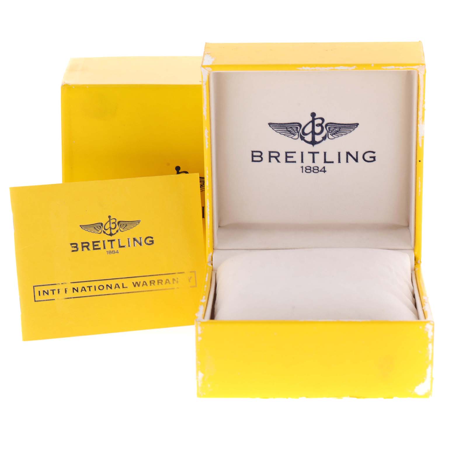 The image shows the open box and international warranty card for a Breitling Superocean A17364 Men's Stainless Steel Blue Dial A17364 Men's Stainless Steel Blue Dial watch.