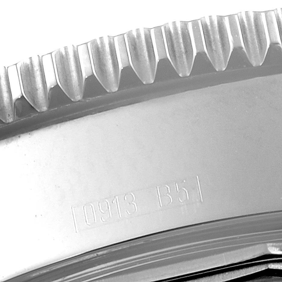 This close-up image shows the outer edge and part of the case back of a Breitling Superocean A17364 Men's Stainless Steel Blue Dial A17364 Men's Stainless Steel Blue Dial watch, featuring the model number engraving.