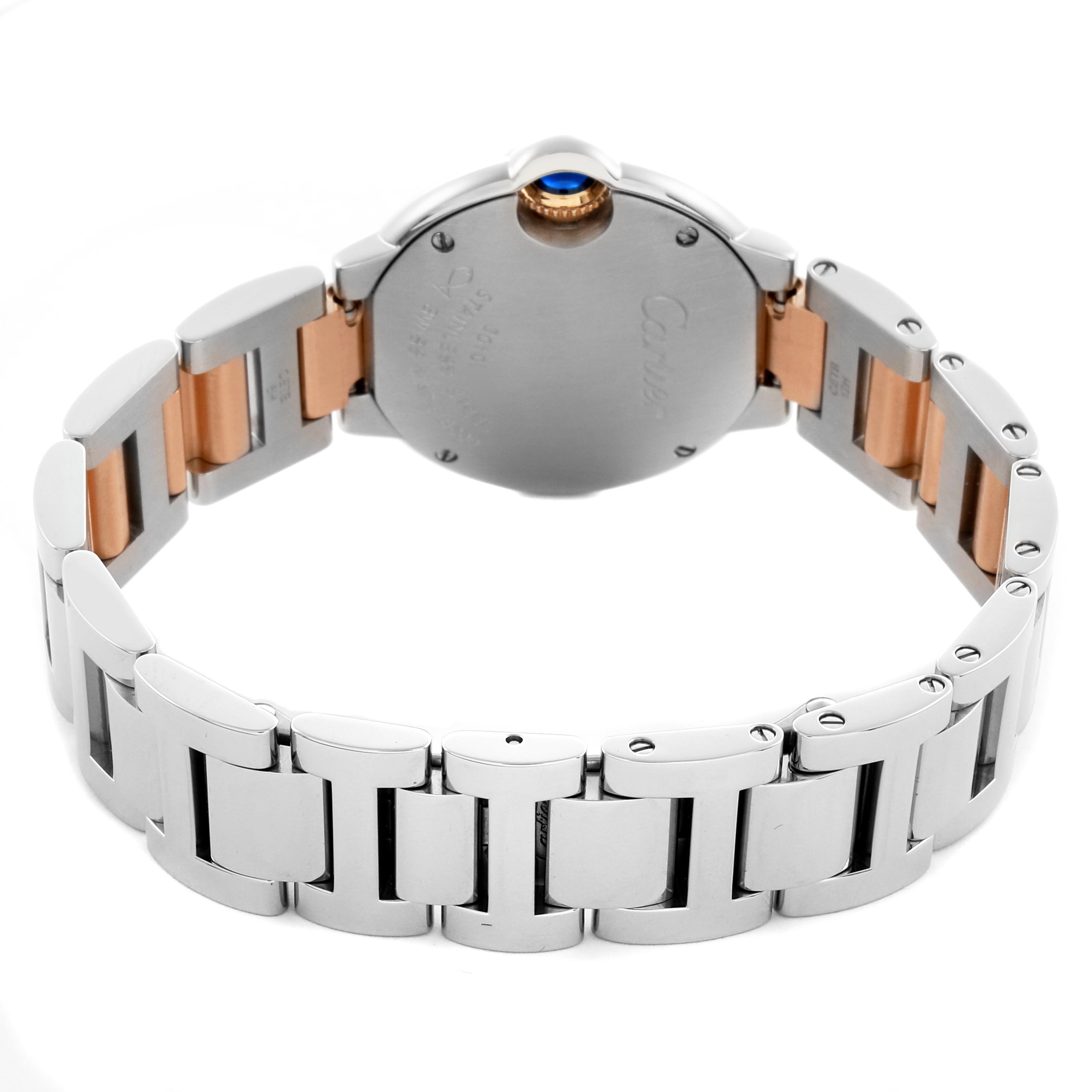 The Cartier Ballon Bleu WE902030 Women
s Steel and Gold (two tone) Silver Dial WE902030 Women
s Steel and Gold (two tone) Silver Dial watch is shown from the back, highlighting the case back and two-tone metal bracelet.