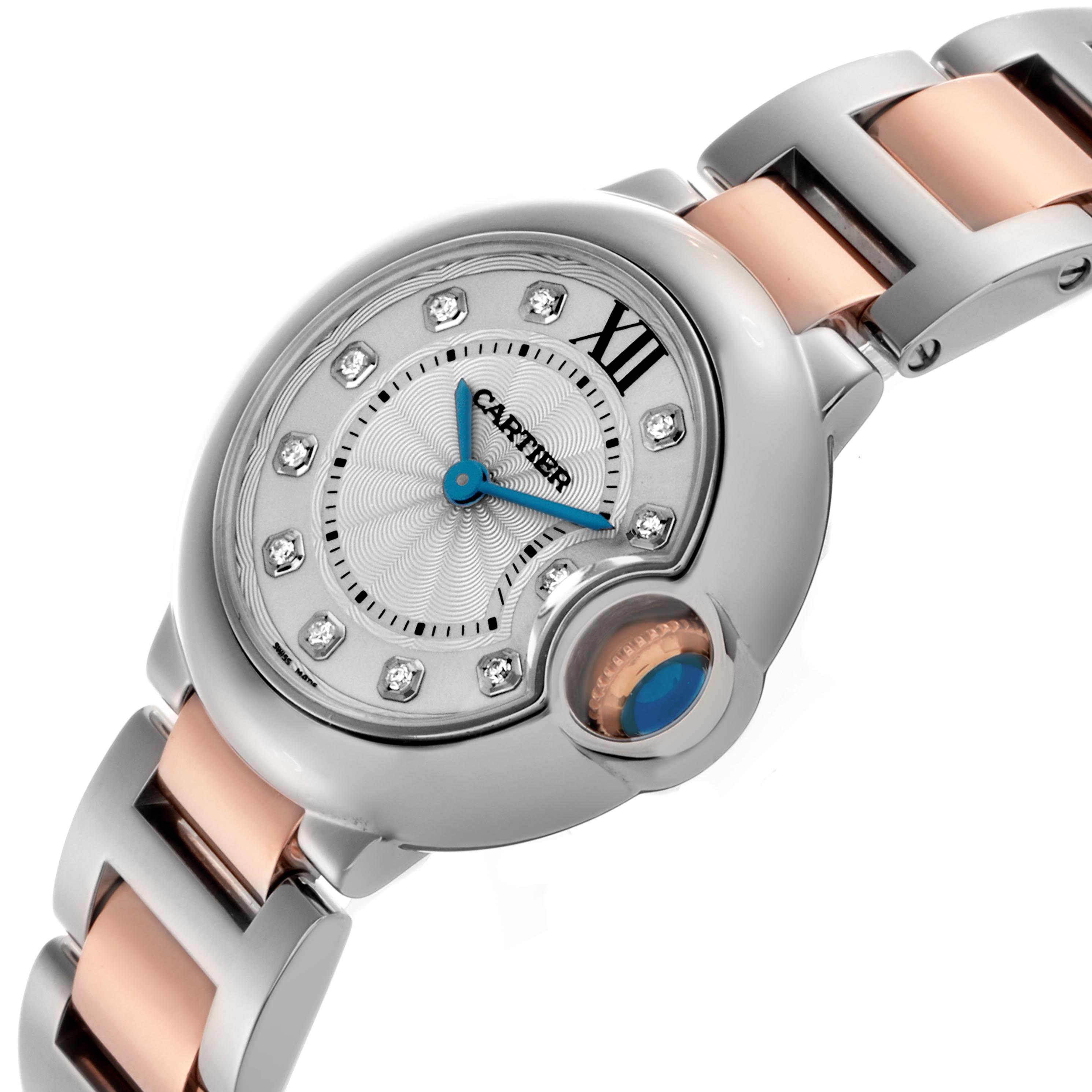 The Cartier Ballon Bleu WE902030 Women
s Steel and Gold (two tone) Silver Dial WE902030 Women
s Steel and Gold (two tone) Silver Dial watch is shown at an angle highlighting the dial, Roman numerals, bejeweled indices, and crown detail.