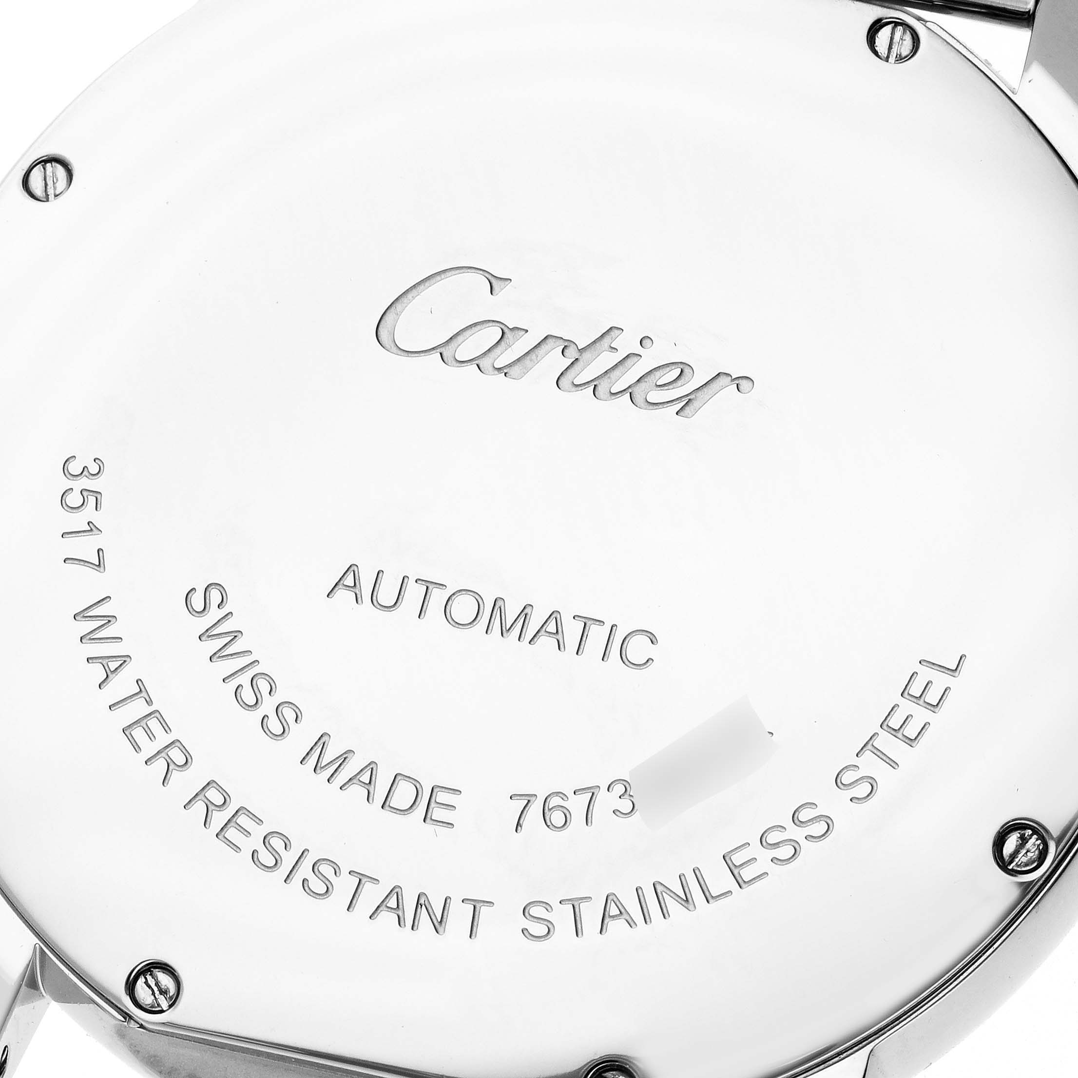 The image shows the backside of the Cartier Ronde W6701011 Men
s Stainless Steel Silver Dial W6701011 Men
s Stainless Steel Silver Dial watch displaying engravings about its specifications.