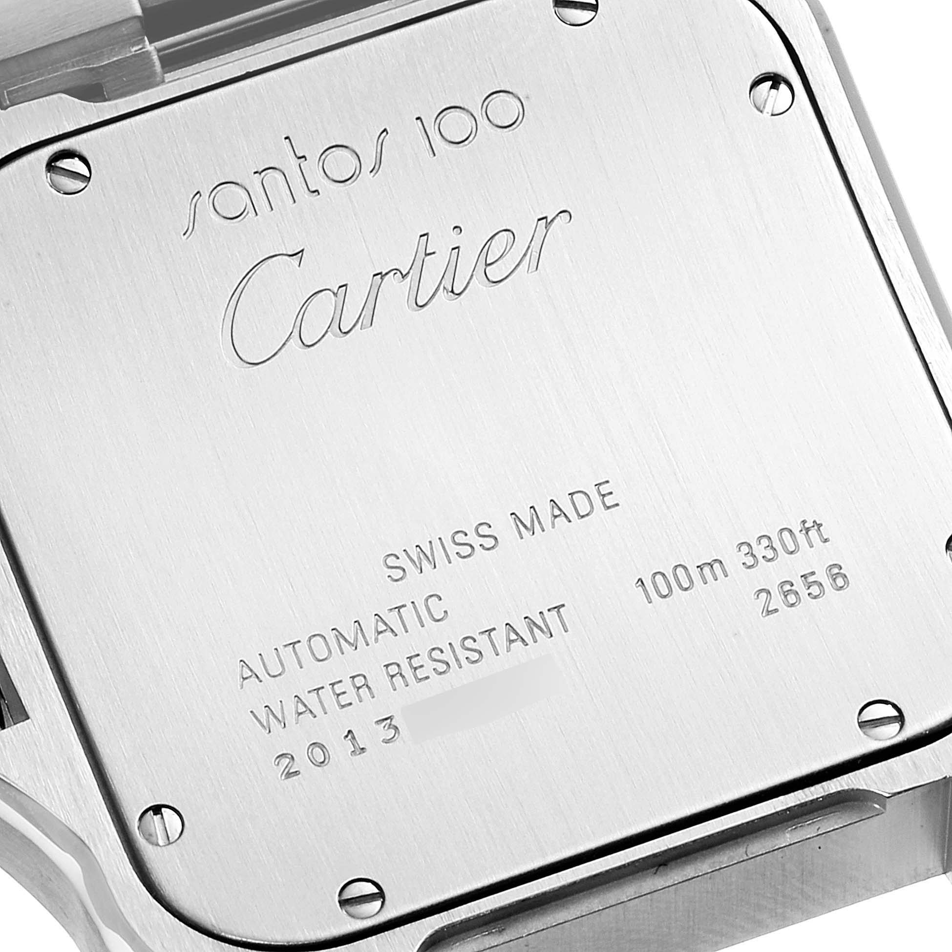 This image shows the back case of a Cartier Santos W200728G  Men's Steel and Gold (two tone) Silver Dial W200728G  Men's Steel and Gold (two tone) Silver Dial 100 watch, displaying inscriptions and specifications.