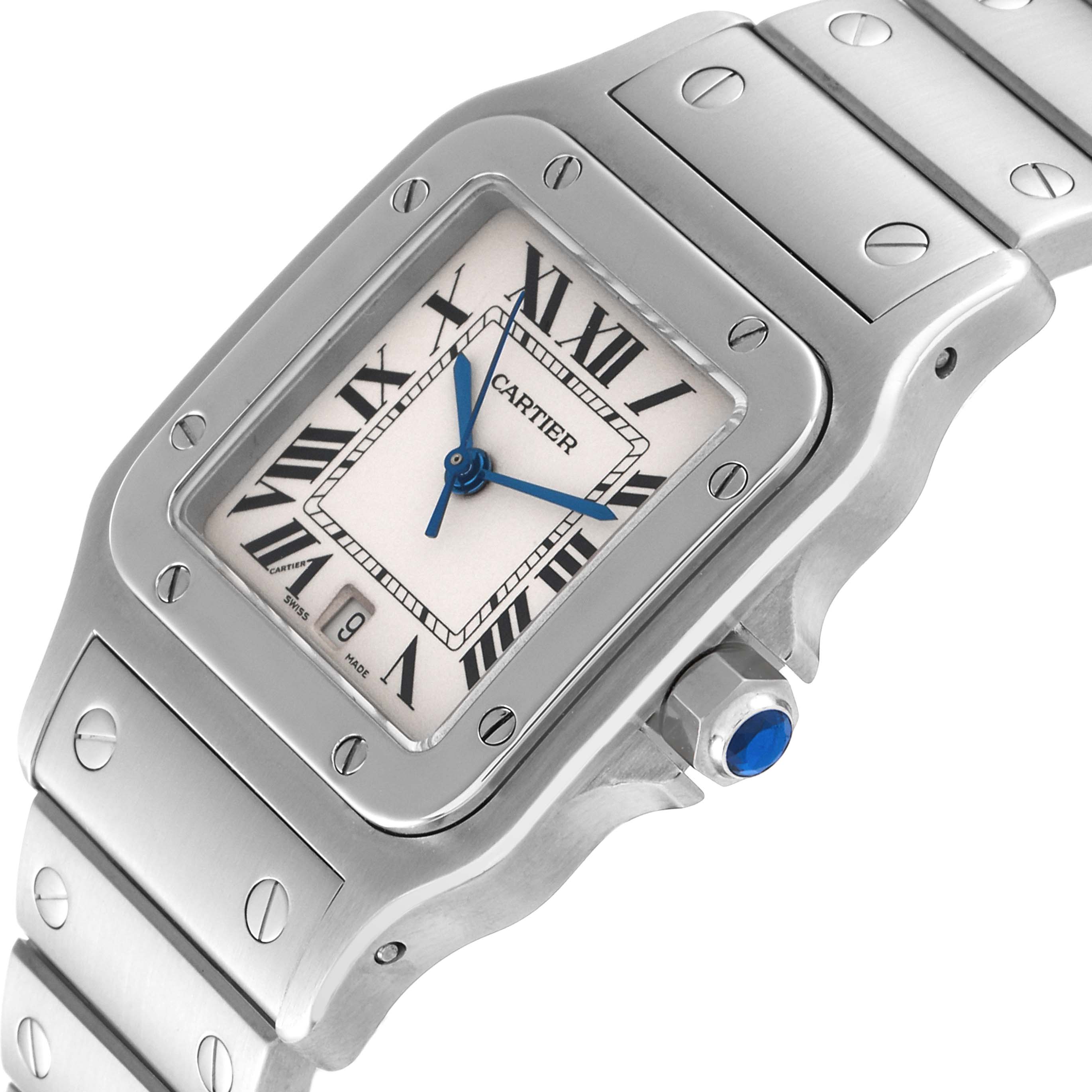 The image shows a Cartier Santos W20060D6 Men
s Stainless Steel Silver Dial W20060D6 Men
s Stainless Steel Silver Dial watch at an angle highlighting the face, bezel, and part of the bracelet.