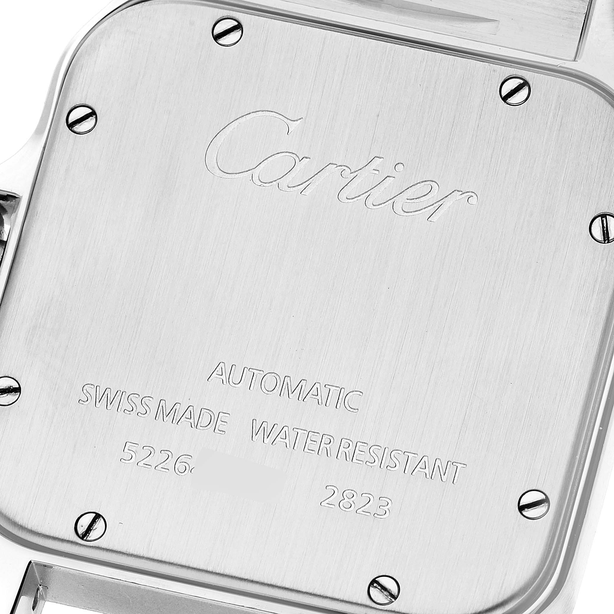 The image shows the case back of a Cartier Santos W20099C4 Men
s Steel and Gold (two tone) Silver Dial W20099C4 Men
s Steel and Gold (two tone) Silver Dial watch, displaying brand engravings and screw details.
