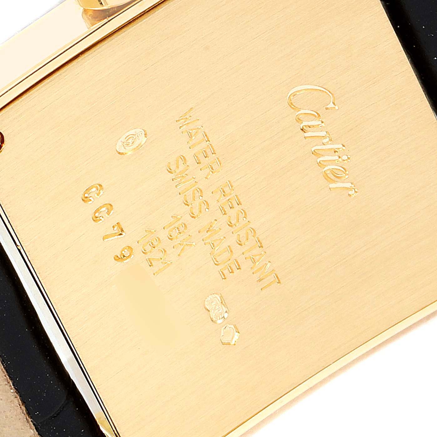 This image shows the back of a Cartier Tank Francaise W5000356 Women's Rose Gold Silver Dial W5000356 Women's Rose Gold Silver Dial watch, highlighting the branding and specifications.