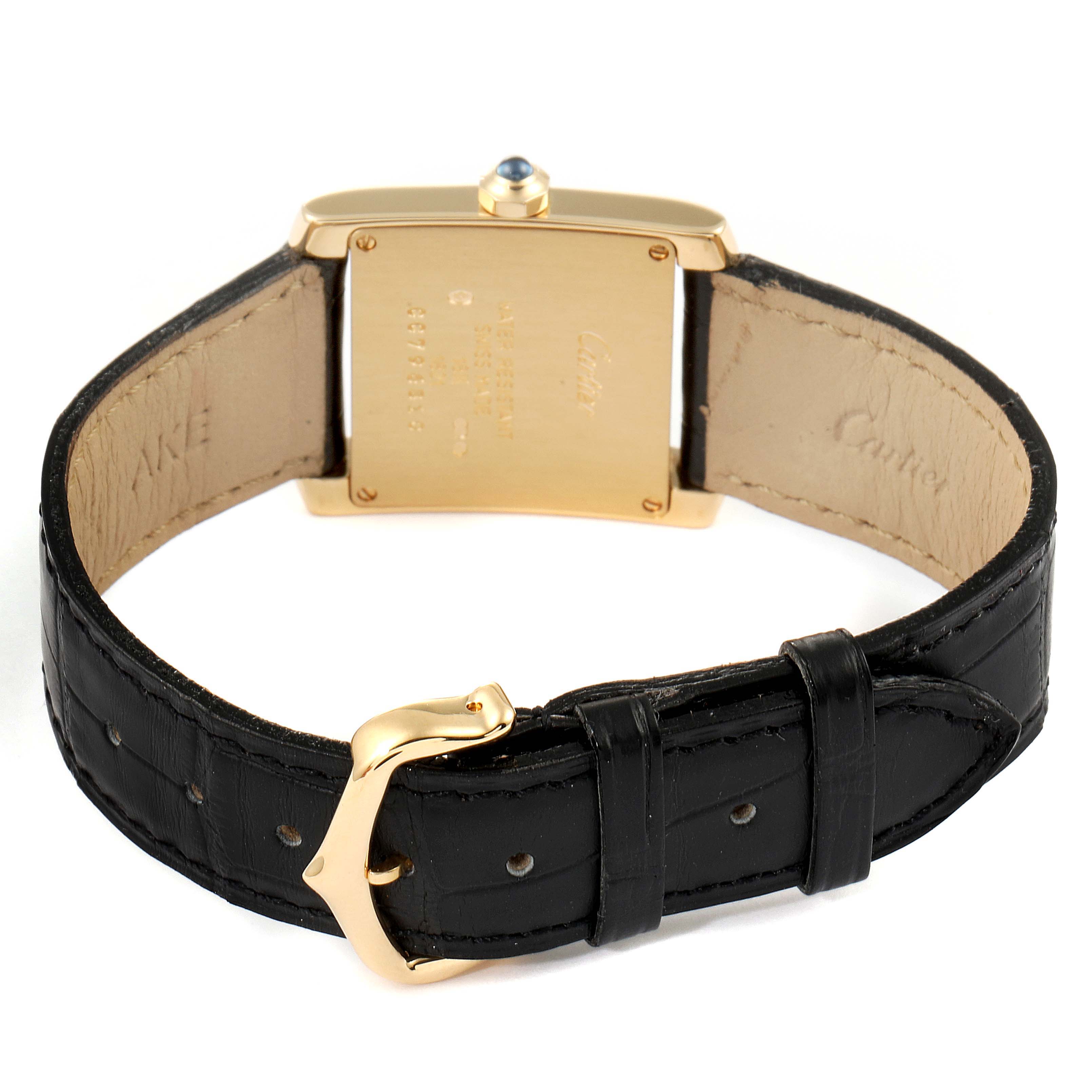 The image shows the back of a Cartier Tank Francaise W5000356 Women's Rose Gold Silver Dial W5000356 Women's Rose Gold Silver Dial watch, including the case back, crown, and black leather strap with a gold buckle.