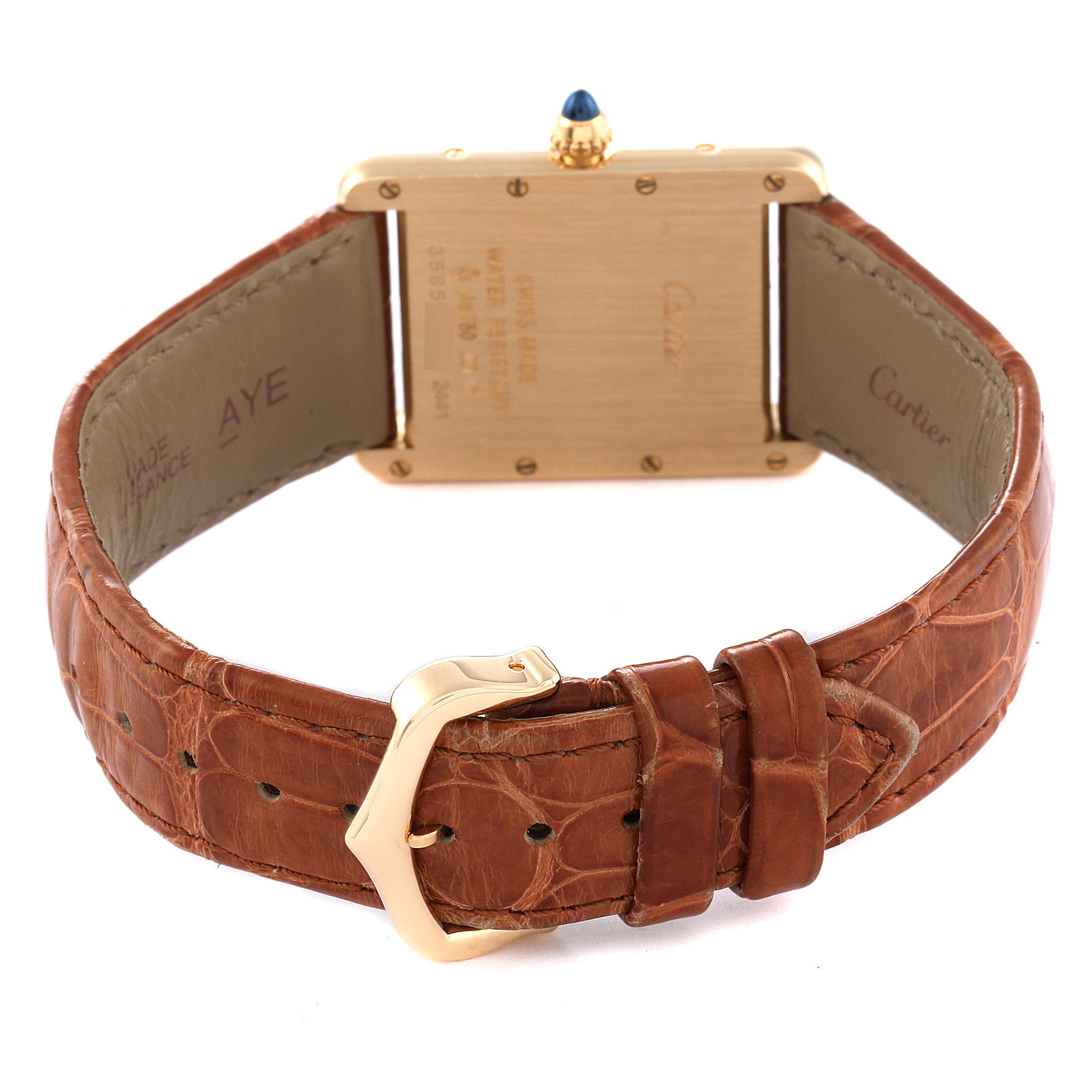 The image shows the back case and brown leather strap of a Cartier Tank Louis W1529756 Men
s Yellow Gold Silver Dial W1529756 Men
s Yellow Gold Silver Dial watch, including the buckle and caseback details.