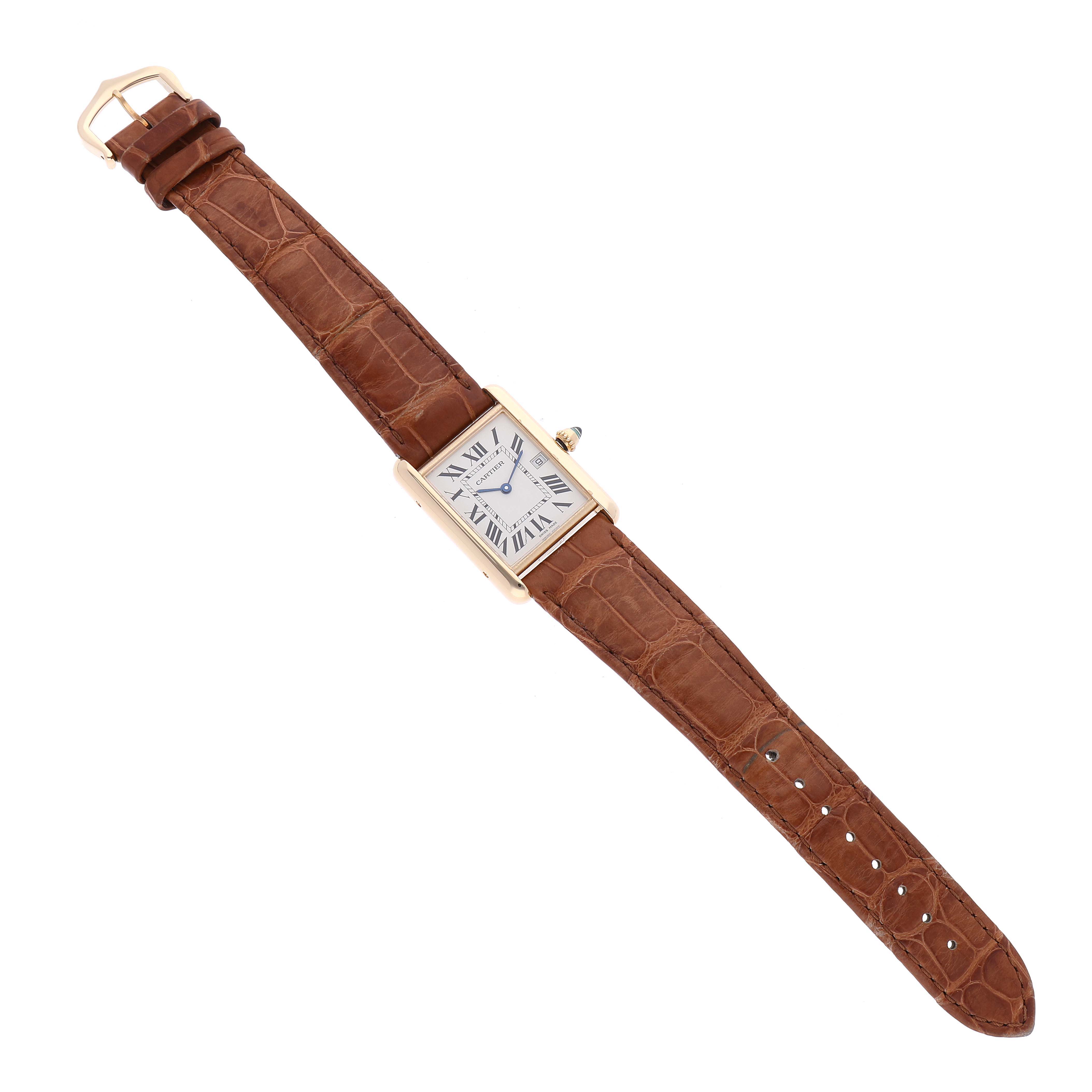 The image shows a full view of the Tank Louis Cartier watch, laying flat with a brown leather strap and a rectangular face.