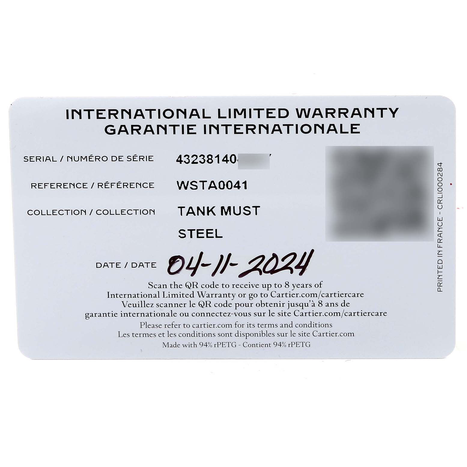 The image shows the international limited warranty card for the Cartier Tank Must WSTA0041 Women's Stainless Steel Silver Dial WSTA0041 Women's Stainless Steel Silver Dial model watch.