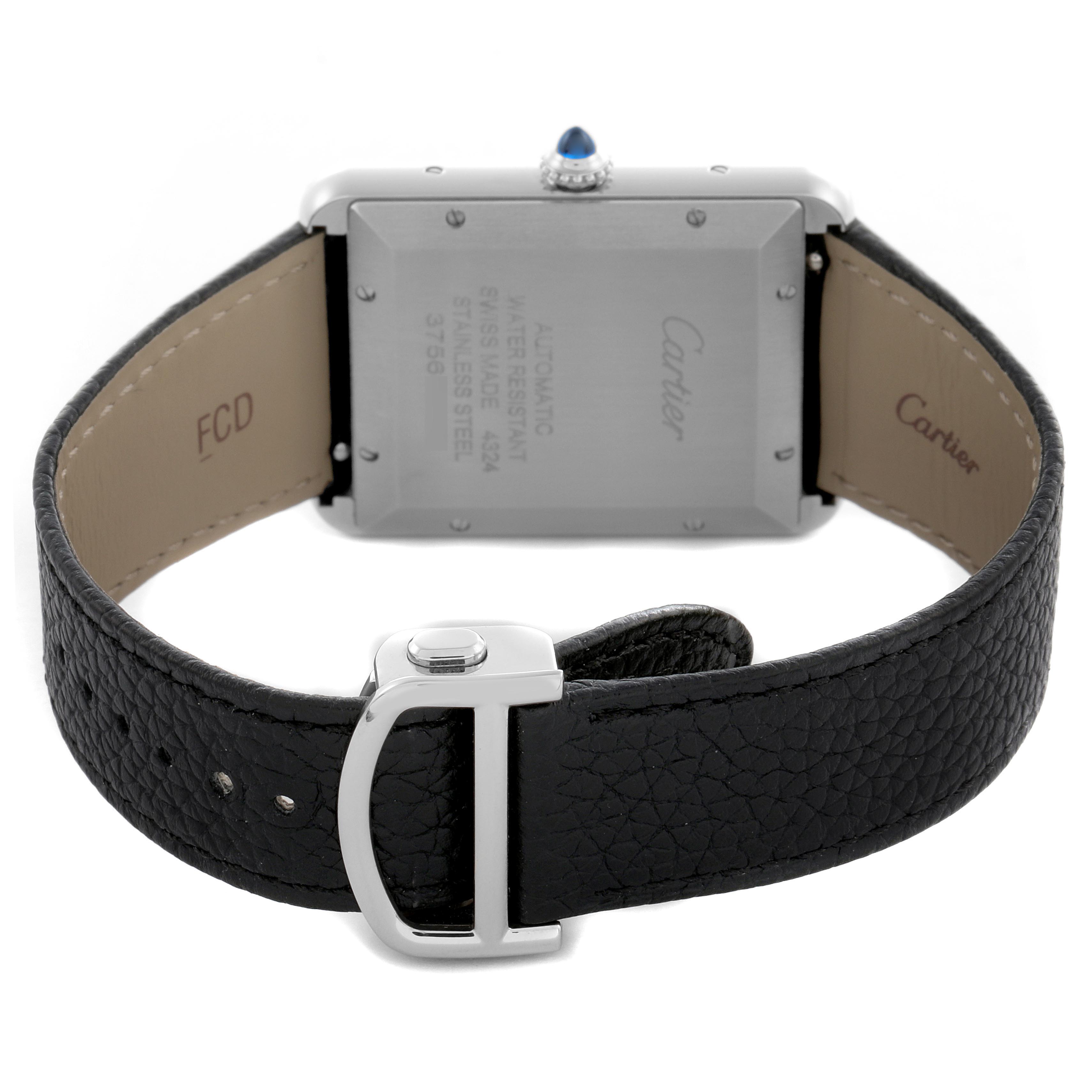 The image shows a Cartier Tank Must WSTA0040 Men's Stainless Steel Silver Dial WSTA0040 Men's Stainless Steel Silver Dial watch from the back, highlighting the case, crown, and black leather strap with a buckle.