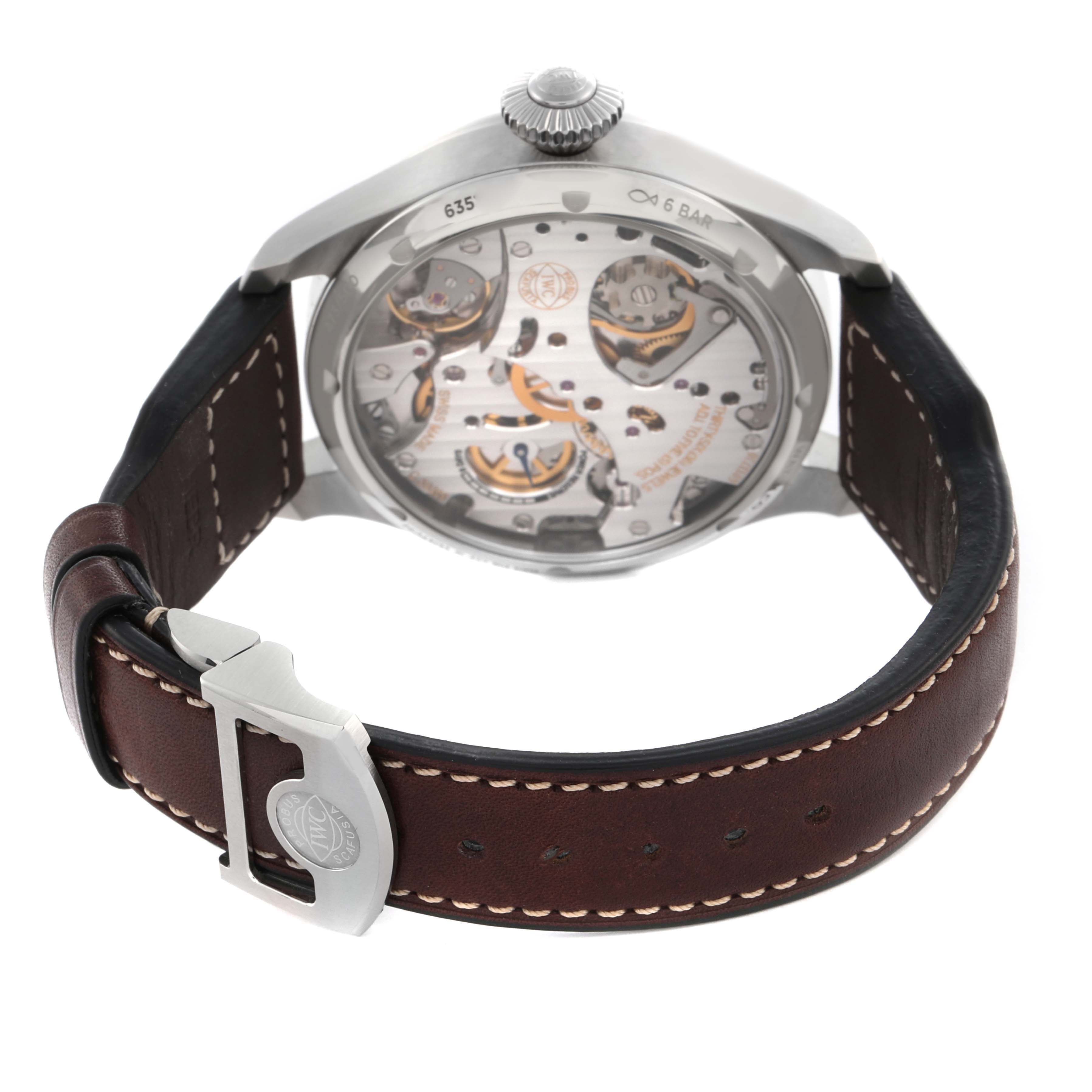 The image shows the back view of an IWC Pilot IW515202 Men's Stainless Steel Blue Dial IW515202 Men's Stainless Steel Blue Dial watch, highlighting its transparent case back and leather strap with a buckle.