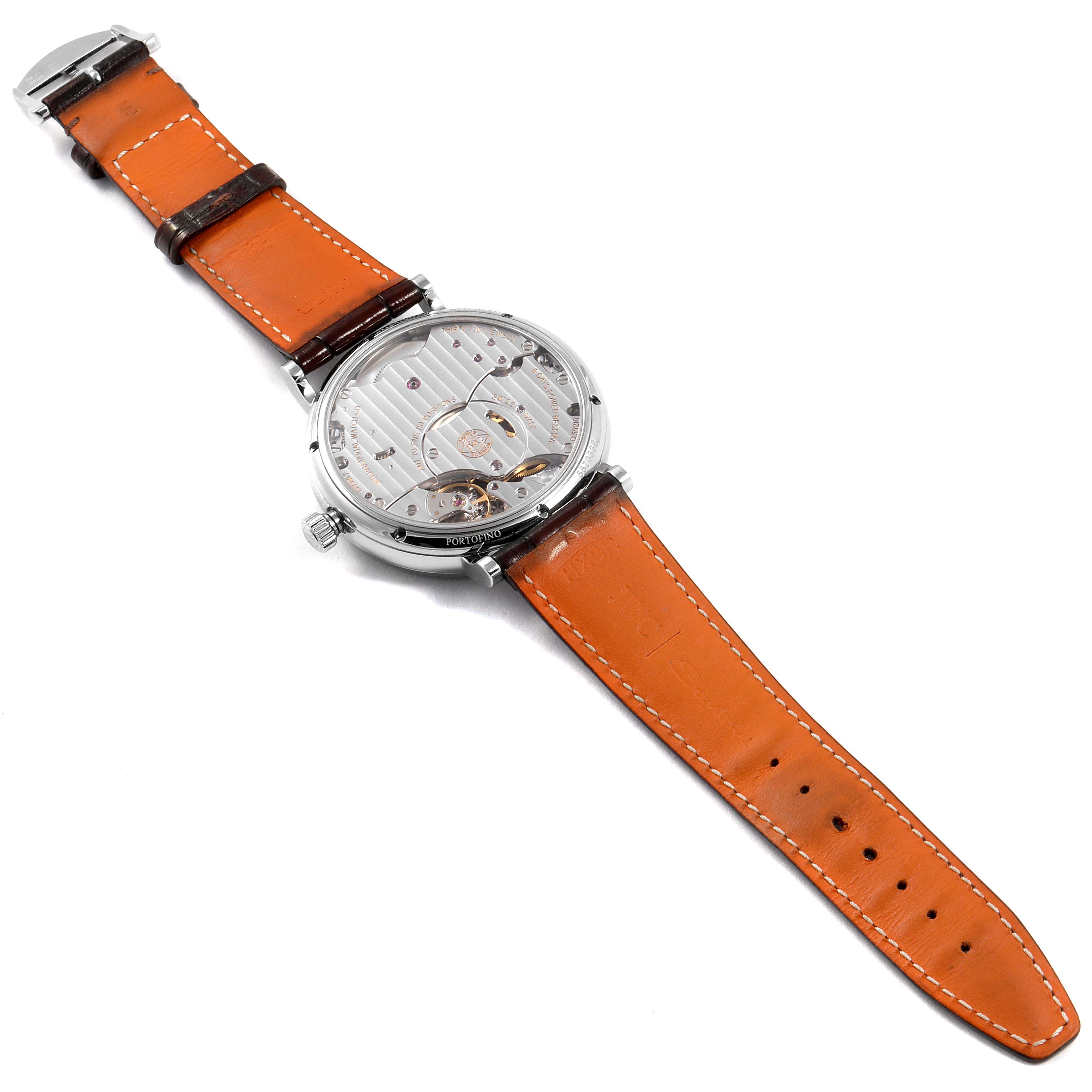 The image shows the back view of the IWC Portofino IW510102 Men's Stainless Steel Black Dial IW510102 Men's Stainless Steel Black Dial watch, displaying its mechanism and brown leather strap.