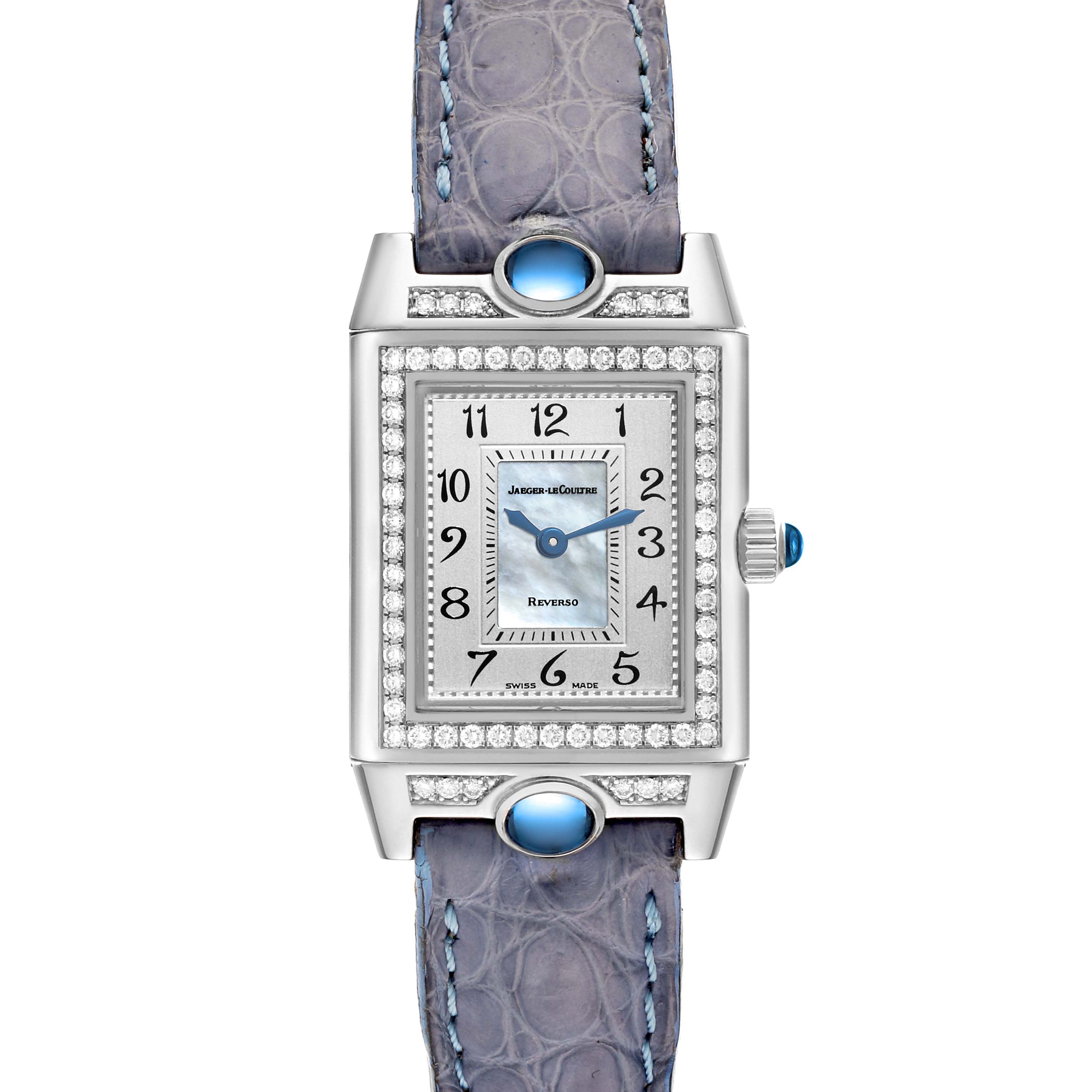 This image shows a front view of a Jaeger-LeCoultre Reverso watch with a rectangular face, diamond bezel, and blue leather strap.