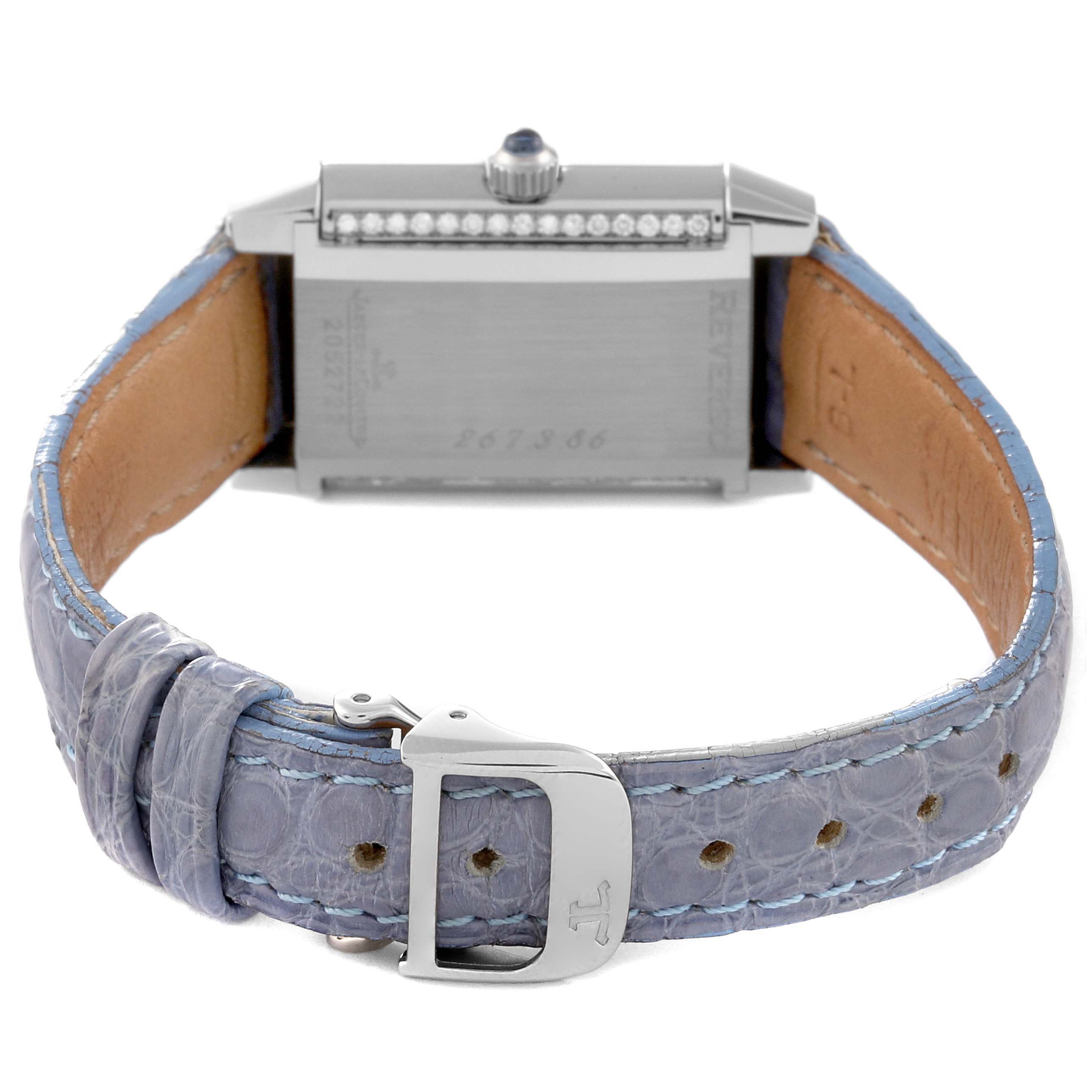 The image shows a Jaeger LeCoultre Reverso Q2623403 Women's White Gold Mother of Pearl Dial Q2623403 Women's White Gold Mother of Pearl Dial watch from the back, including its leather strap and clasp.