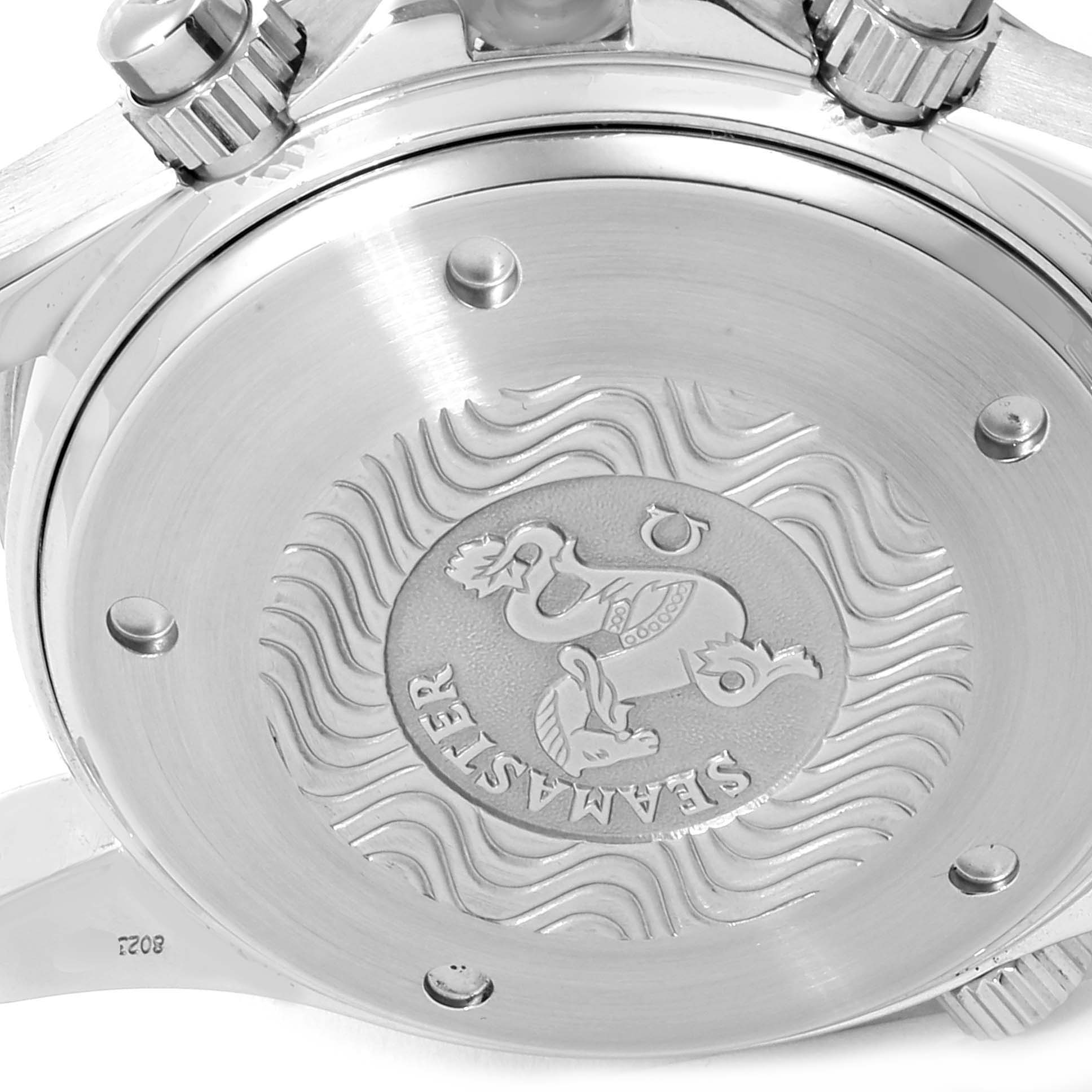 The image shows the back case and part of the crown of an Omega Seamaster 2598.80.00 Men
s Stainless Steel Blue Dial 2598.80.00 Men
s Stainless Steel Blue Dial watch, displaying the engraved emblem and brand details.