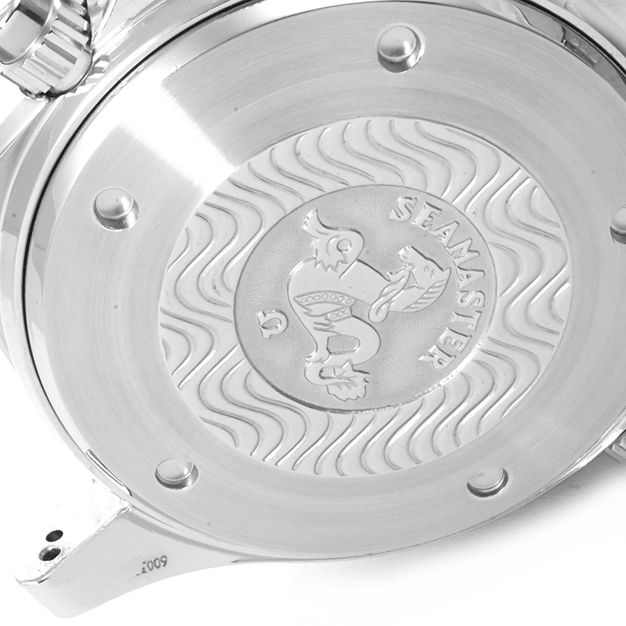 This image shows a close-up of the case back of an Omega Seamaster 2598.80.00 Men
s Stainless Steel Blue Dial 2598.80.00 Men
s Stainless Steel Blue Dial watch, featuring the distinctive wave pattern and emblem.