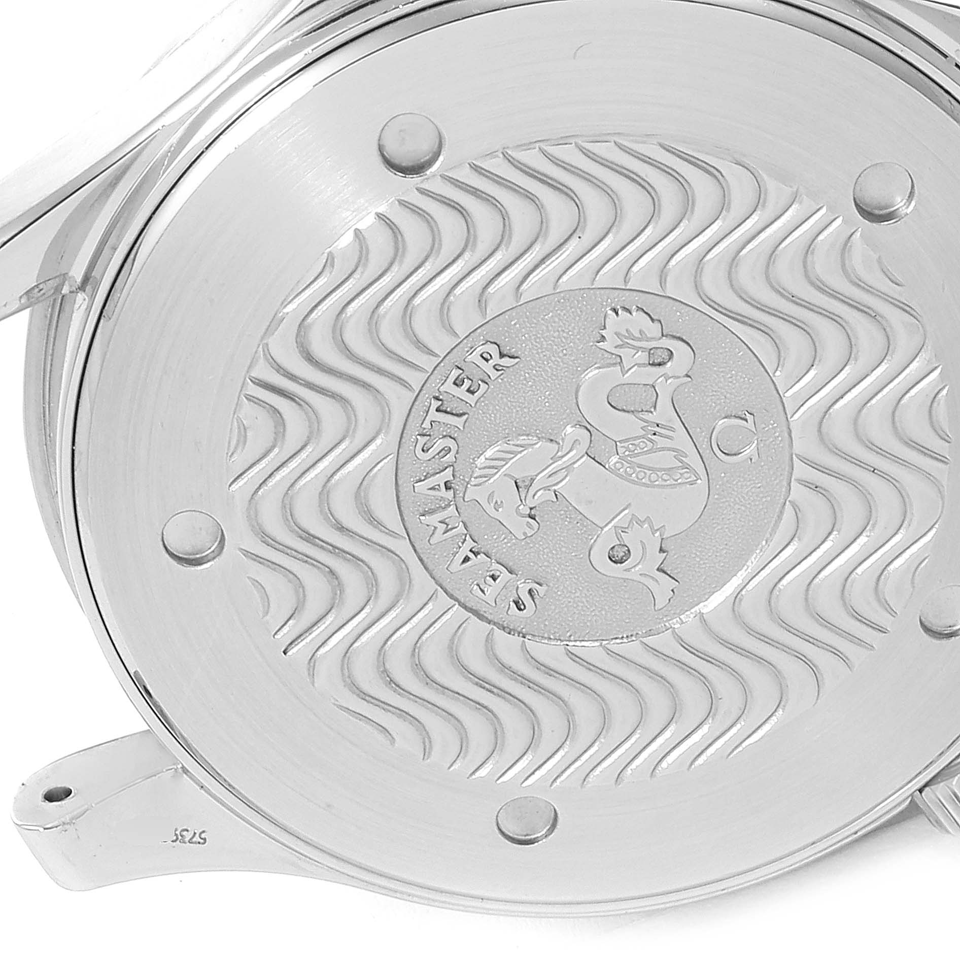 The image shows the case back of an Omega Seamaster 2265.80.00 Men
s Stainless Steel Blue Dial 2265.80.00 Men
s Stainless Steel Blue Dial watch, displaying its engraved logo and wave pattern.