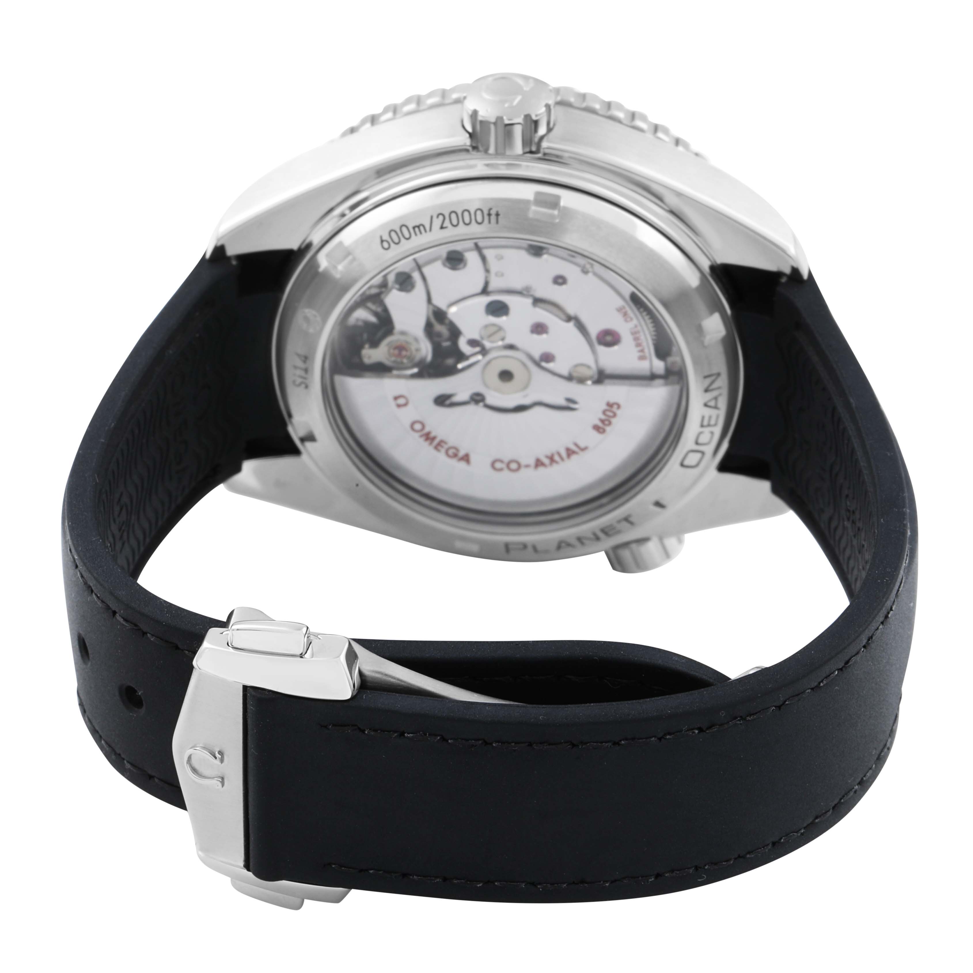 The Omega Planet Ocean 232.32.44.22.01.001 Men's Stainless Steel Black Dial watch is shown from the back, highlighting the transparent case back and strap buckle.