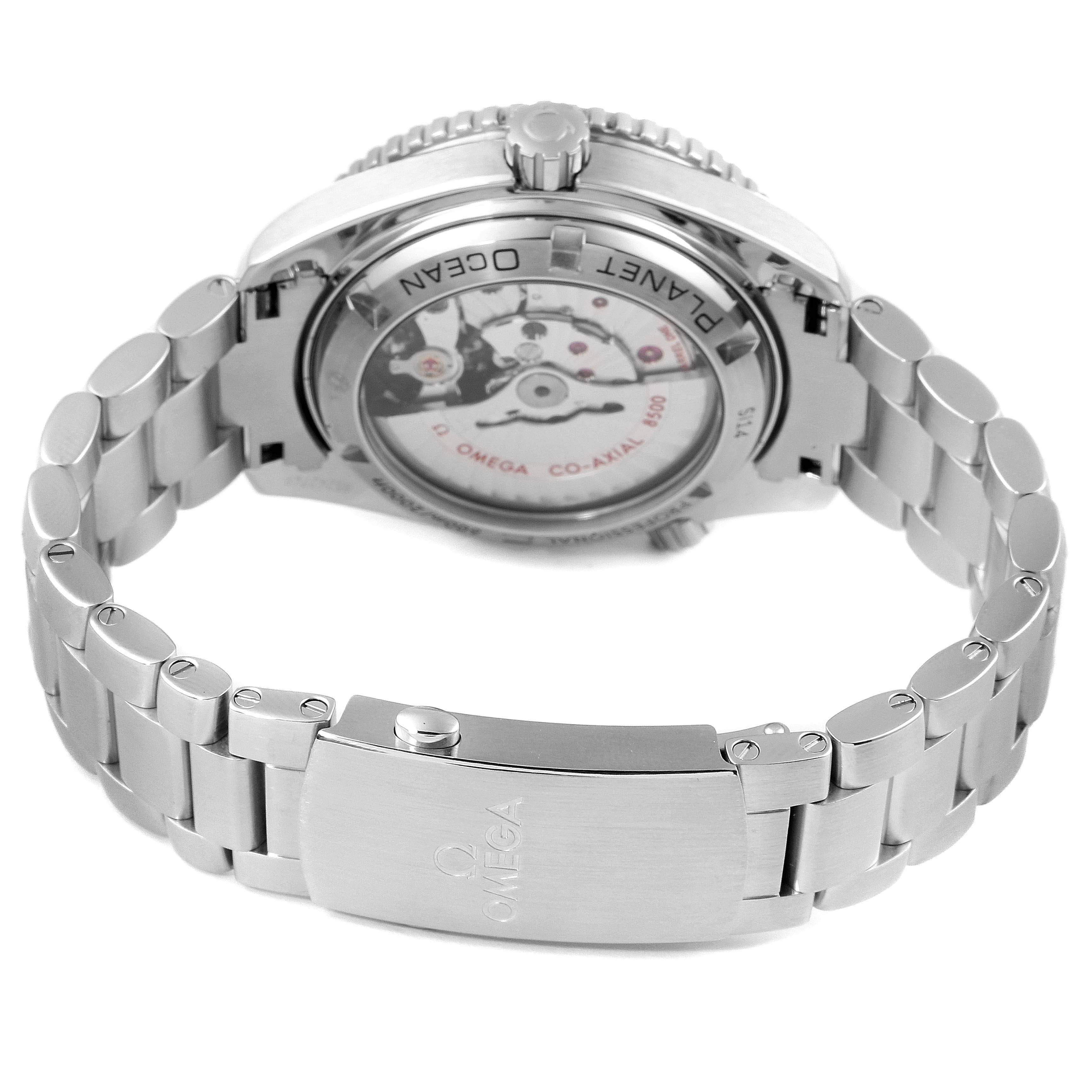 The image shows the back case and stainless steel bracelet of the Omega Planet Ocean 232.30.42.21.01.003 Men
s Stainless Steel Black Dial 232.30.42.21.01.003 Men
s Stainless Steel Black Dial watch, highlighting its movement through the transparent case back.