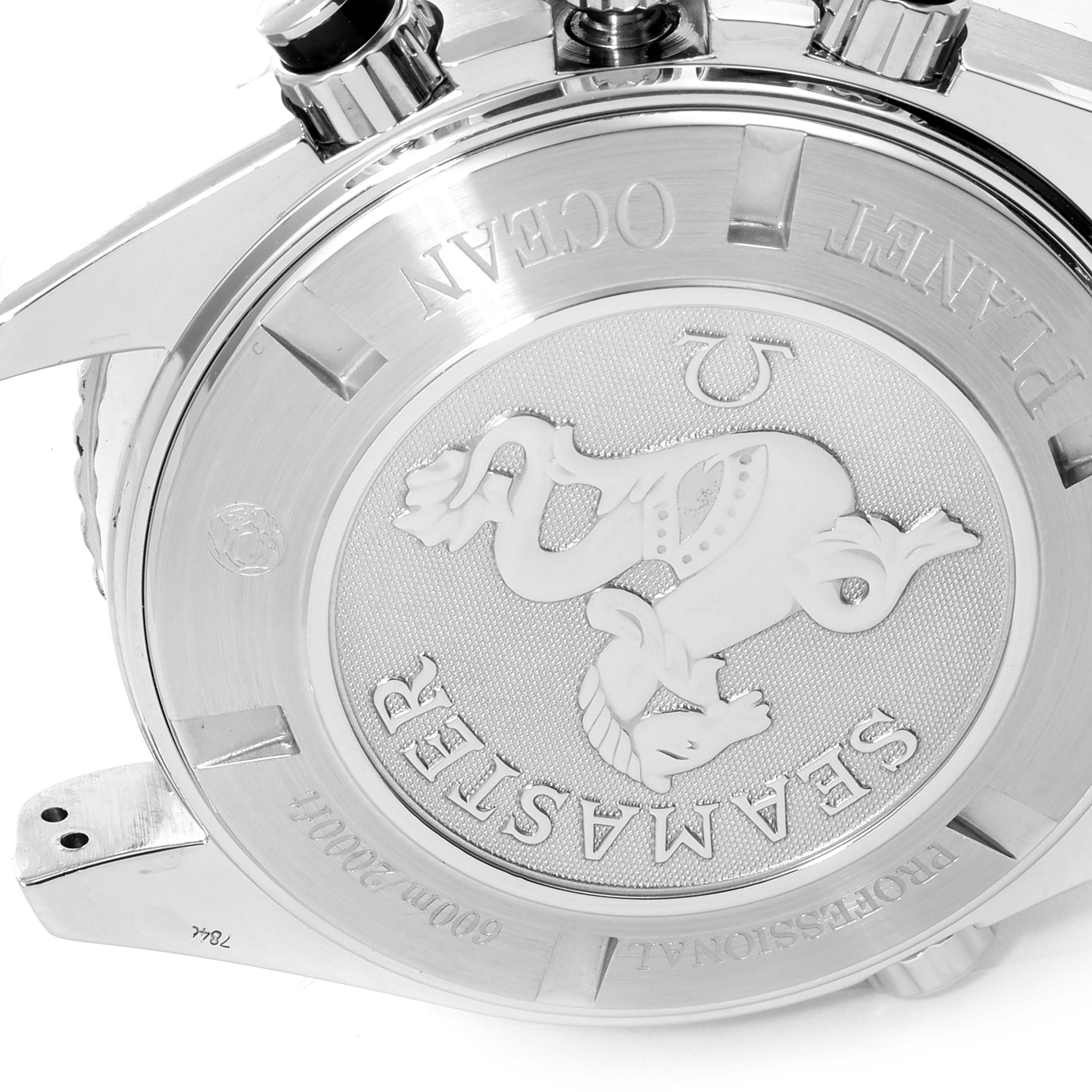 The image shows the case back and part of the lugs of an Omega Planet Ocean 2210.51.00 Men's Stainless Steel Black Dial 2210.51.00 Men's Stainless Steel Black Dial watch.