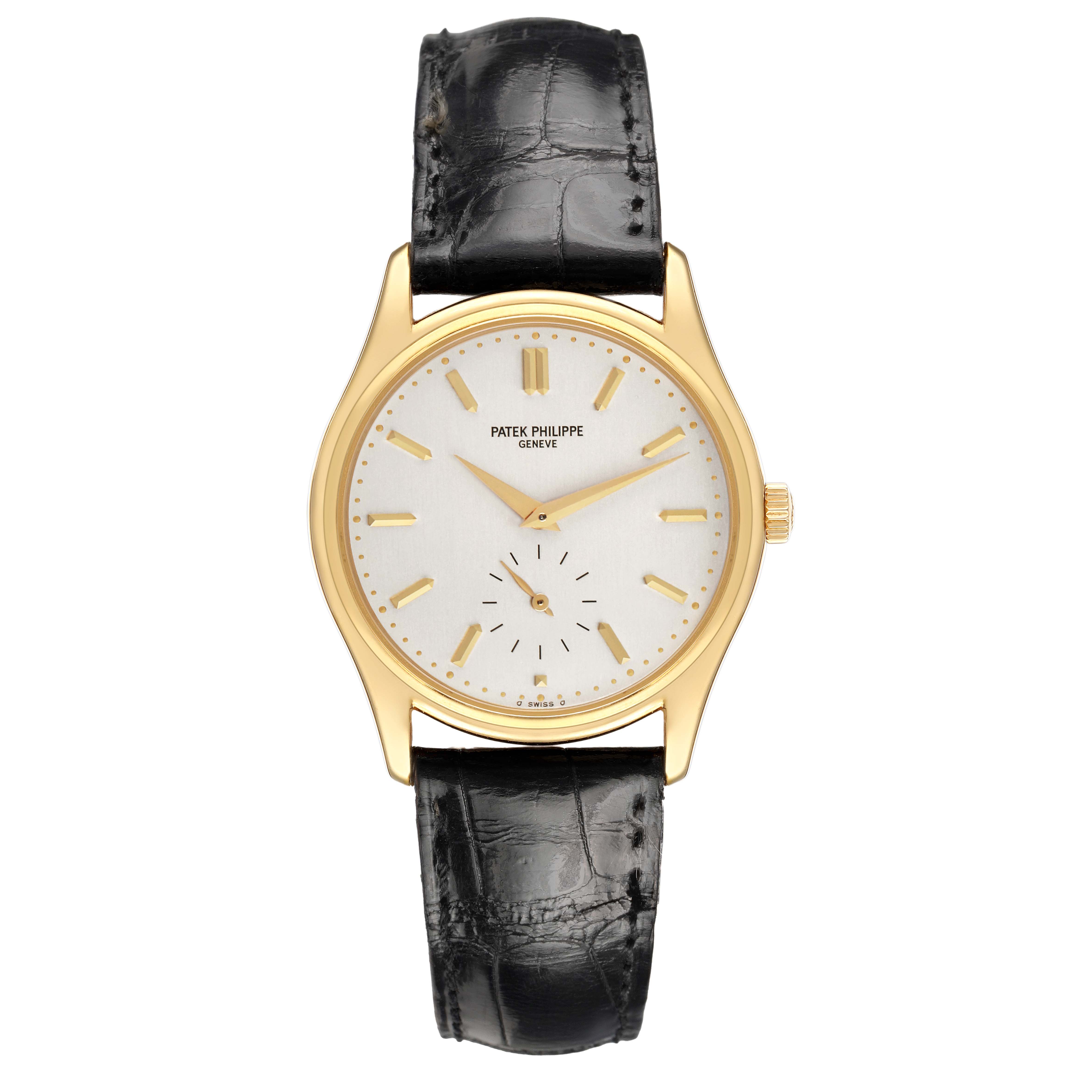 The image shows a frontal view of the Patek Philippe Calatrava 5023 5023J Men's Yellow Gold Silver Dial watch, highlighting the dial, hour markers, and leather strap.
