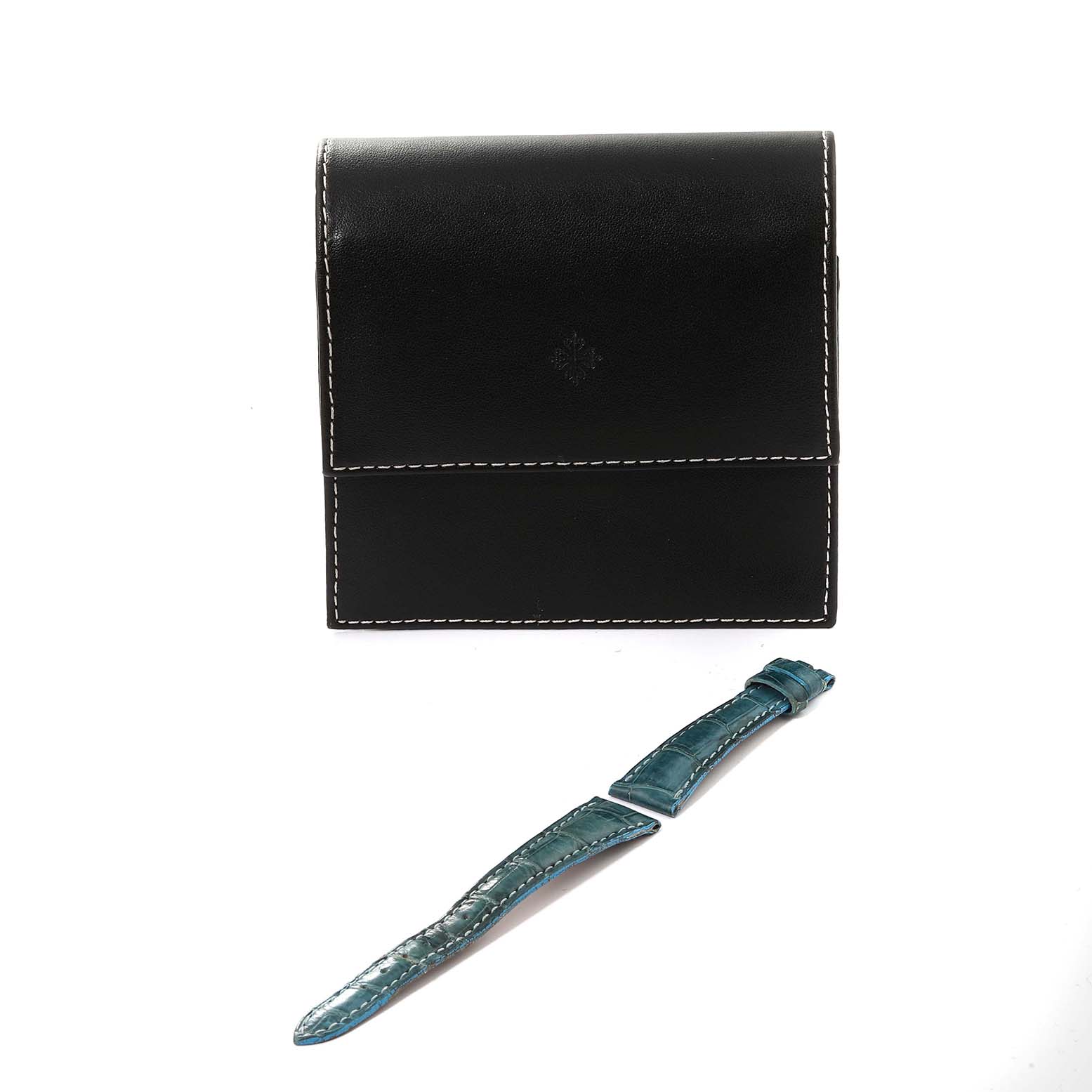 The image shows a black Patek Philippe Calatrava 4864J Women's Yellow Gold White Dial 4864J Women's Yellow Gold White Dial watch case and a green watch strap.