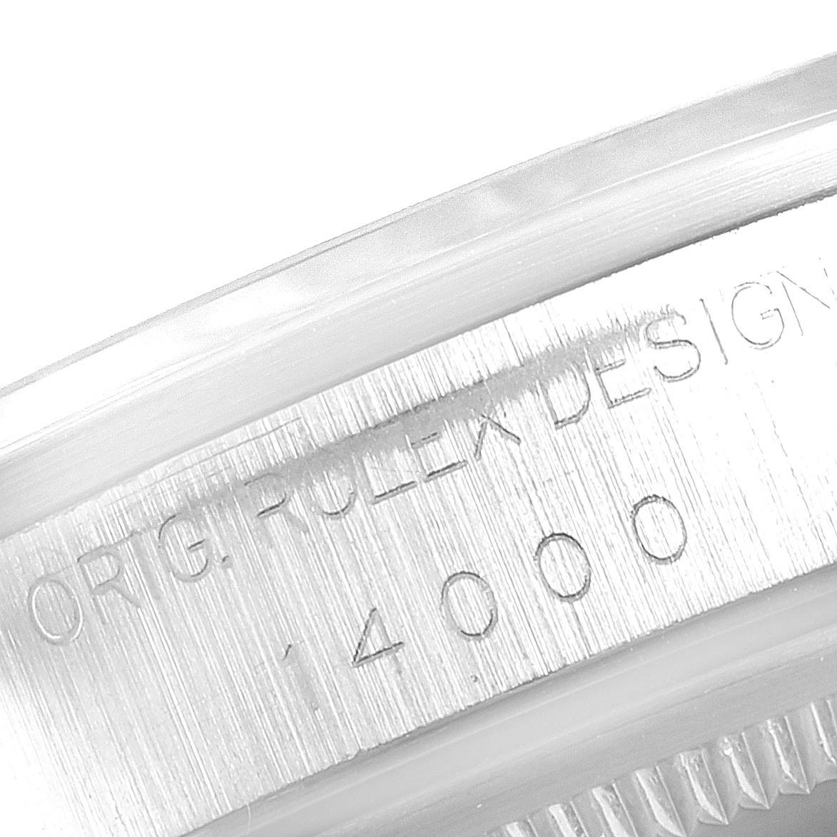 The image shows a close-up view of the engraved serial number and "ORIG ROLEX DESIGN" marking on the case of a Rolex Air-King 14000 Men's Stainless Steel Black Dial 14000 Men's Stainless Steel Black Dial watch.