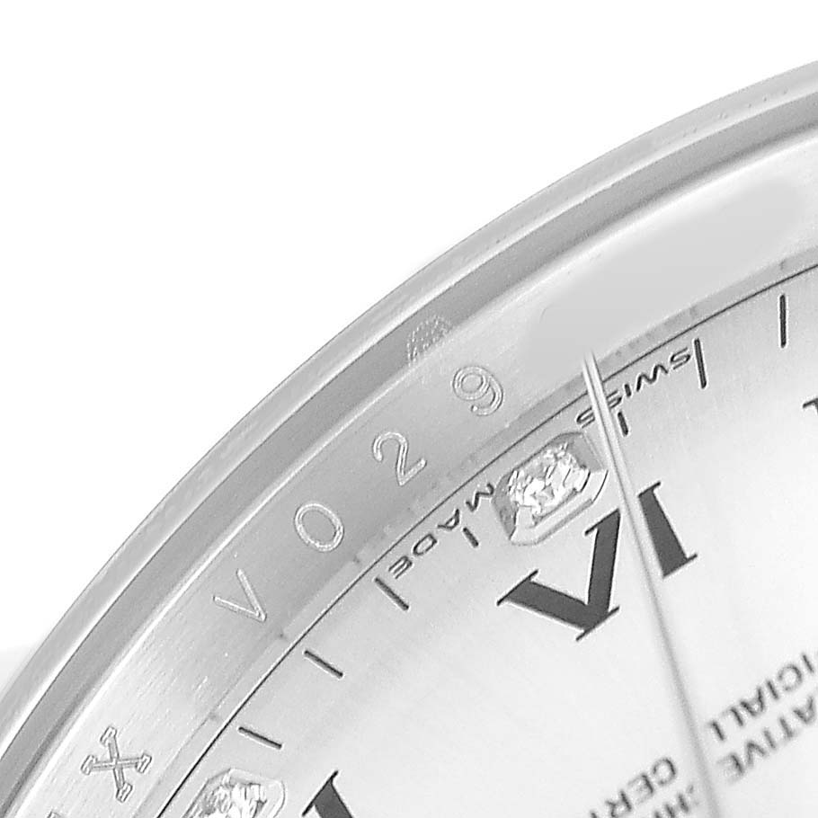 The image shows a close-up of the dial and bezel of a Rolex Air-King 114234 Men's Stainless Steel Silver Dial watch, highlighting the numerals and markers.