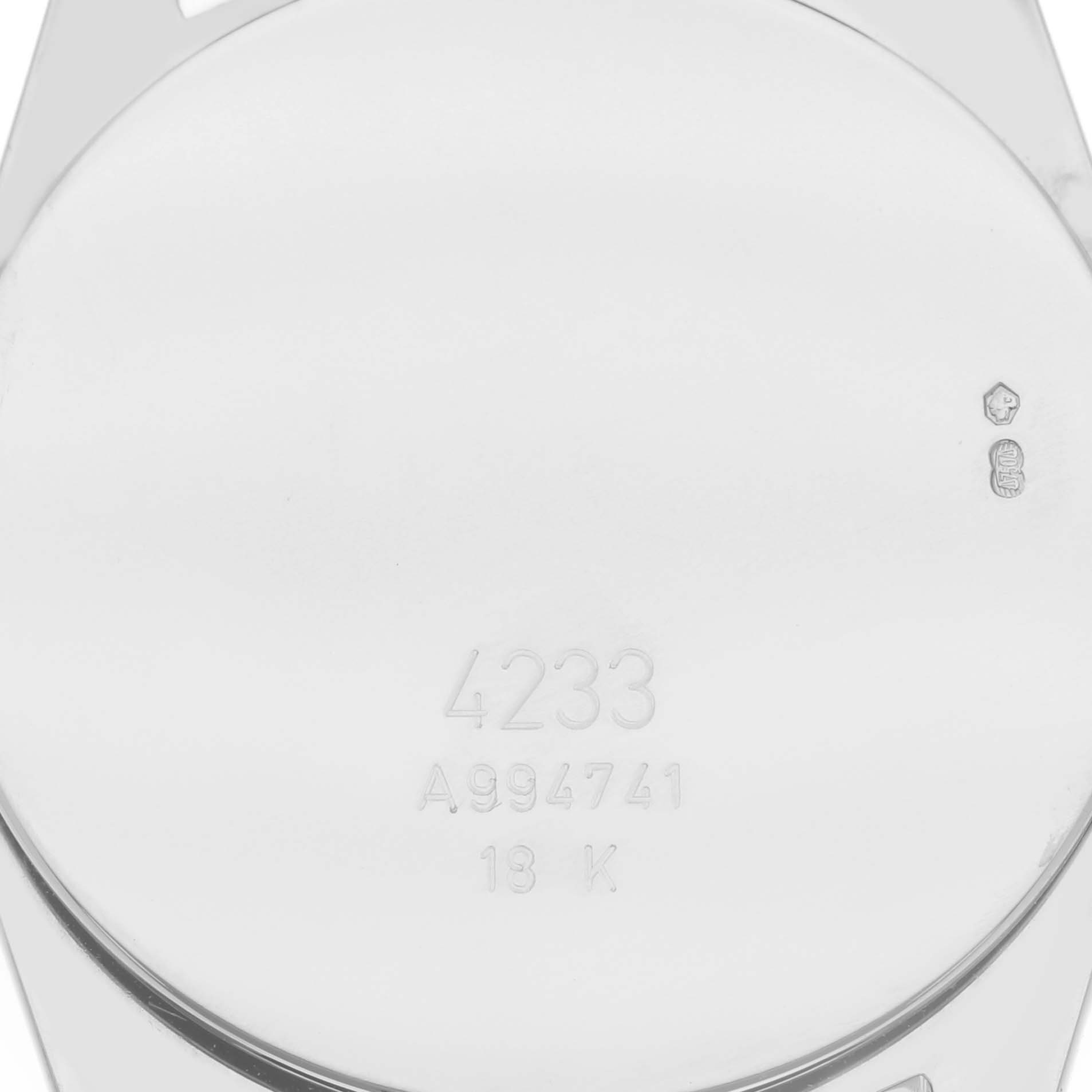 This image shows the back casing of a Rolex Cellini 4233/9 Men's White Gold Black Dial 4233/9 Men's White Gold Black Dial model watch with the model number and gold purity marks.